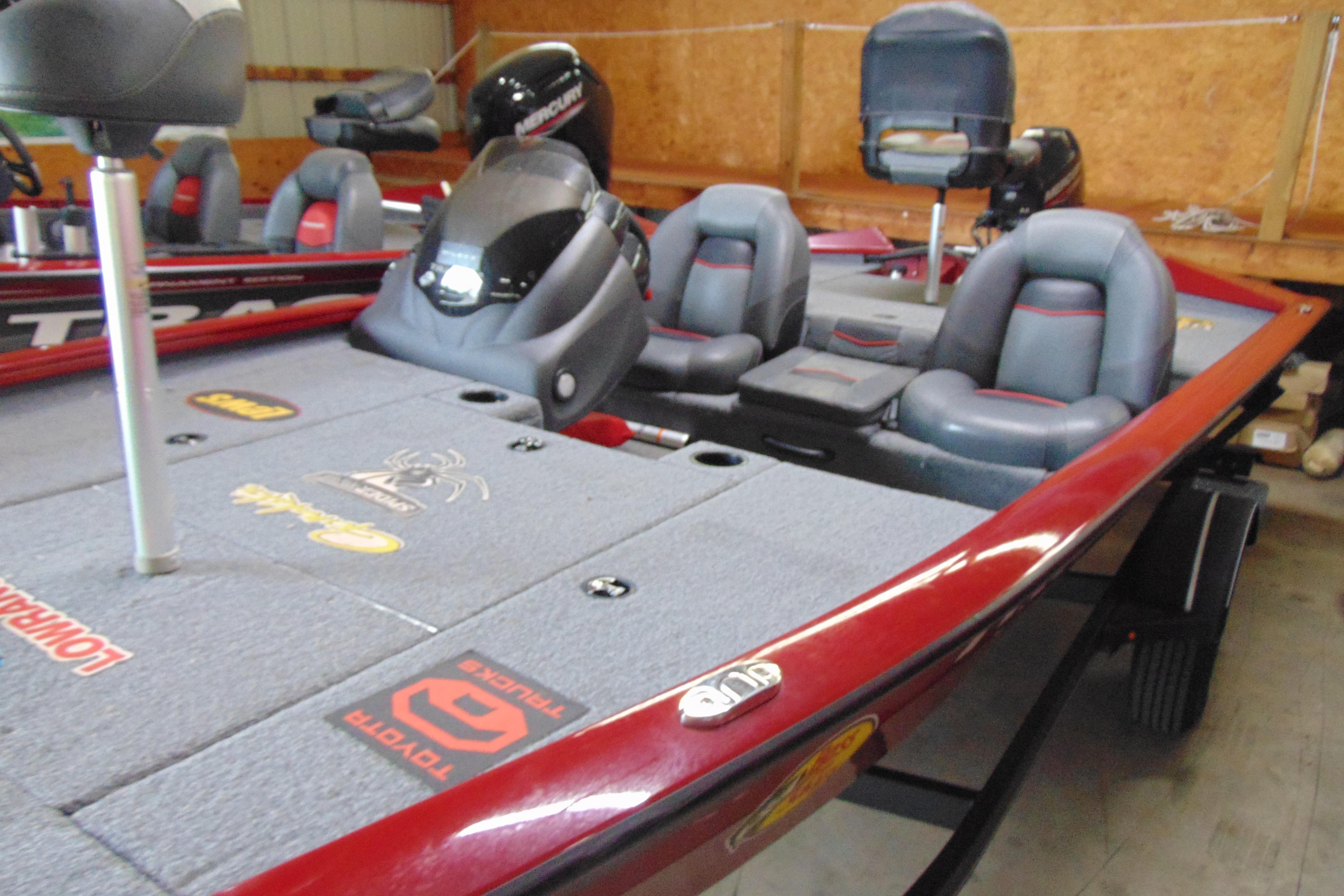 2022 Bass Tracker Pro 17 boat with red trim and comfortable seating.