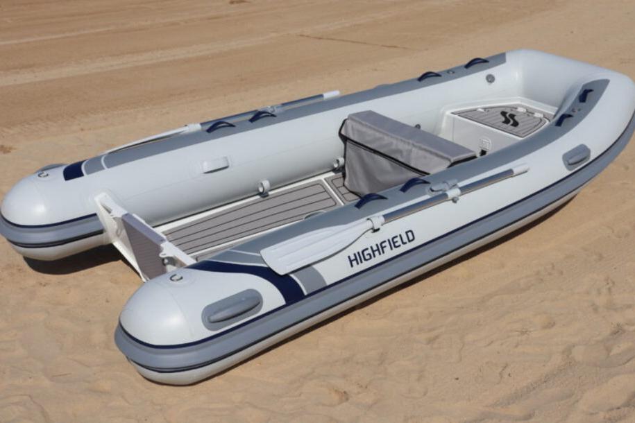 2025 Highfield CL360 inflatable boat on sandy beach.