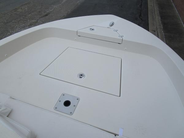 2024 Ranger 2360 Bay boat deck with storage compartments.