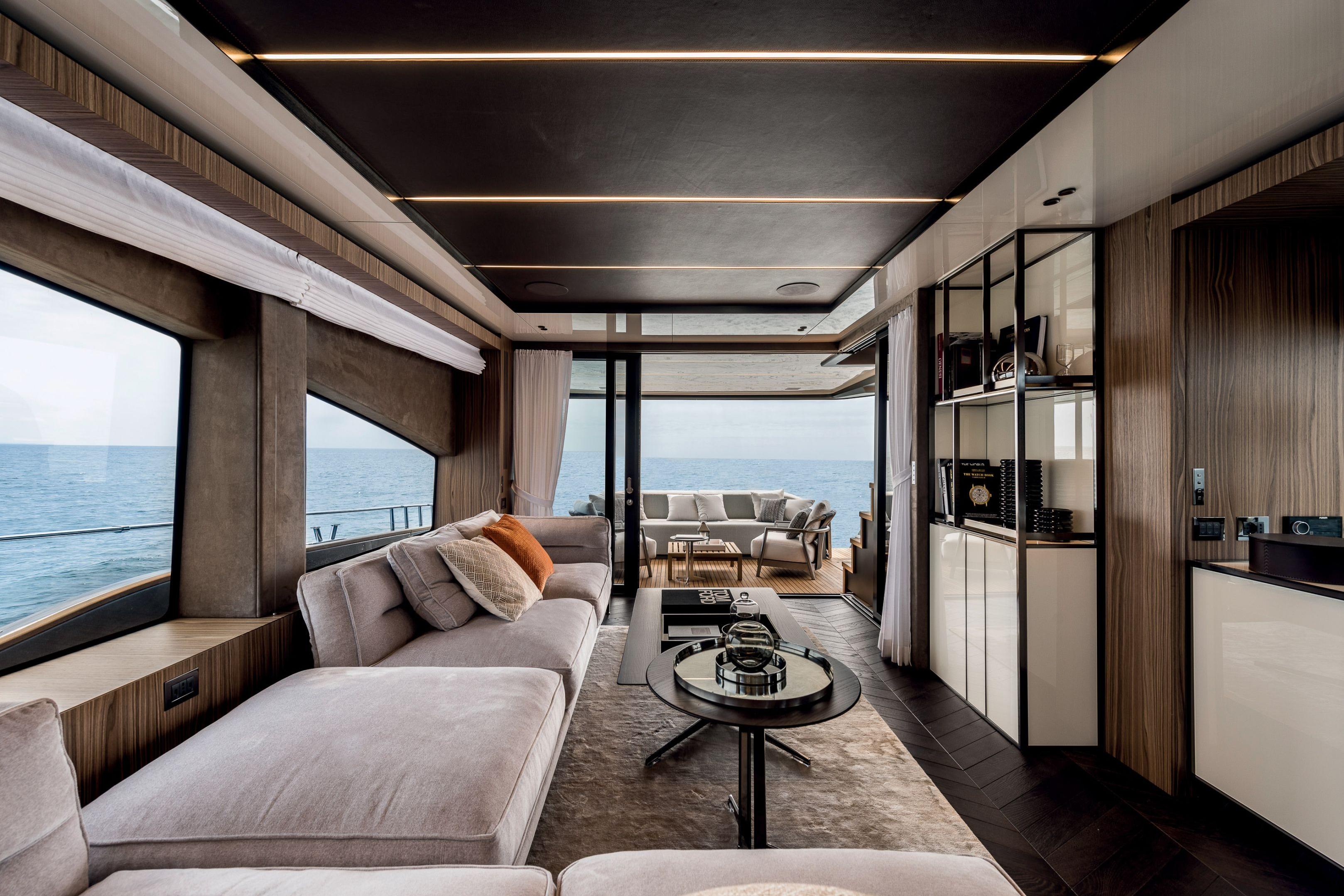 Luxurious interior of 2026 Cranchi Settantotto 78 yacht with ocean view and modern furnishings.