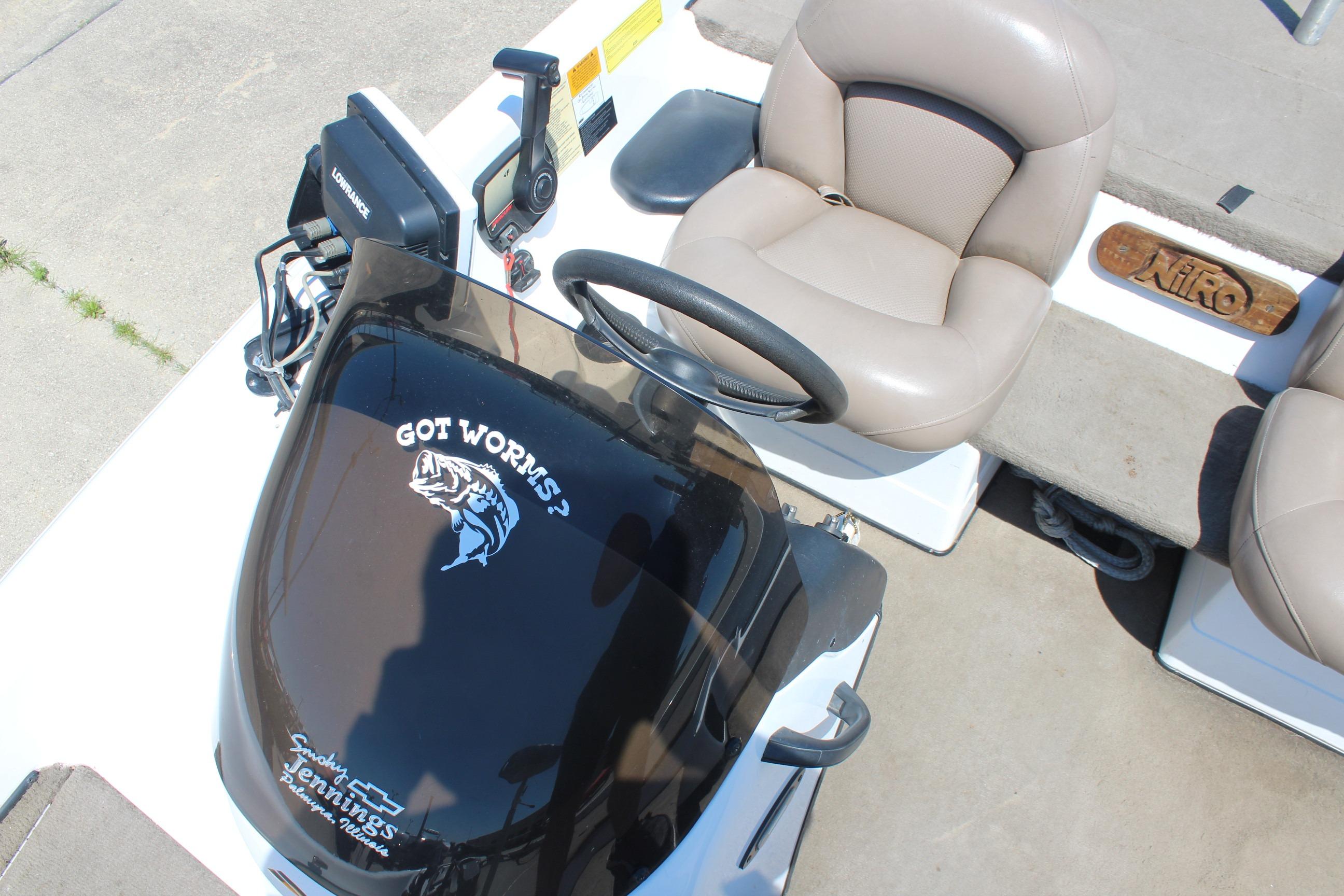 2003 Nitro NX 750 SC boat interior with steering wheel and "Got Worms?" decal.