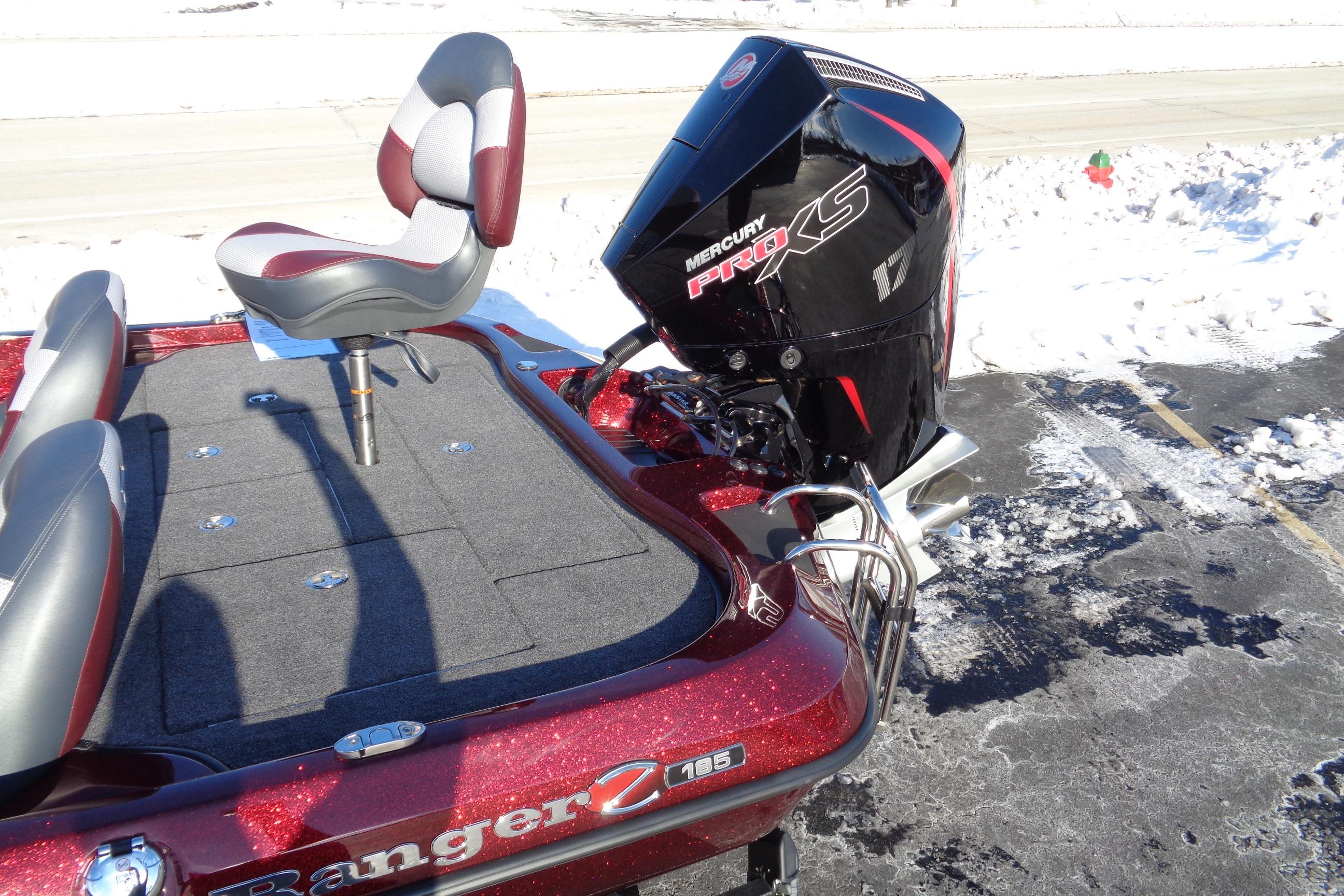 2026 Ranger Z185 boat with Mercury Pro XS engine, parked on snowy pavement.