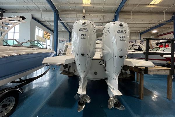 2023 Regal LX36 boat with twin 425 V8 engines in showroom.