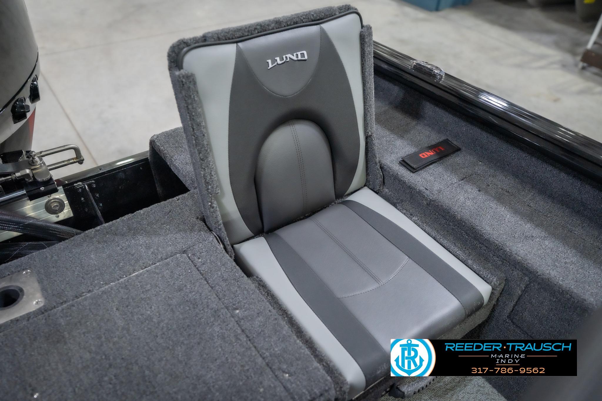 2026 Lund 2075 Impact XS boat seat with gray upholstery, showcased at Reeder-Trausch Marine.