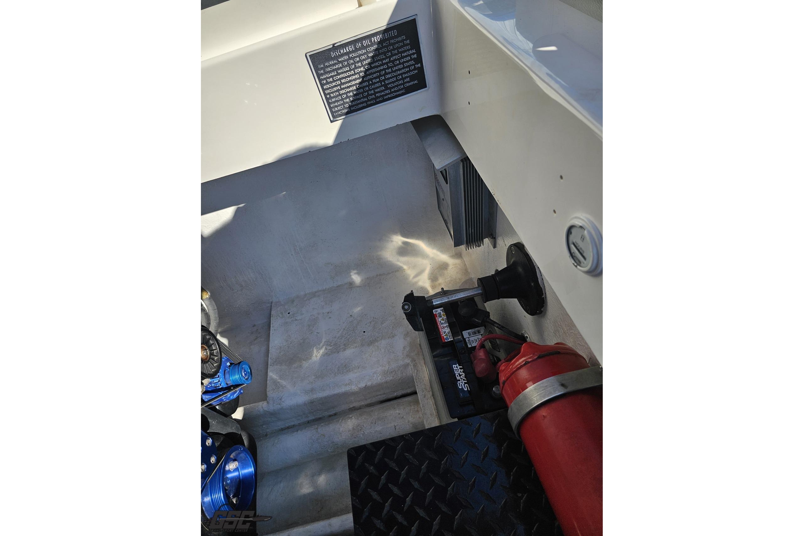 Interior of 2002 Hustler 388 SLINGSHOT boat showing equipment and safety features.
