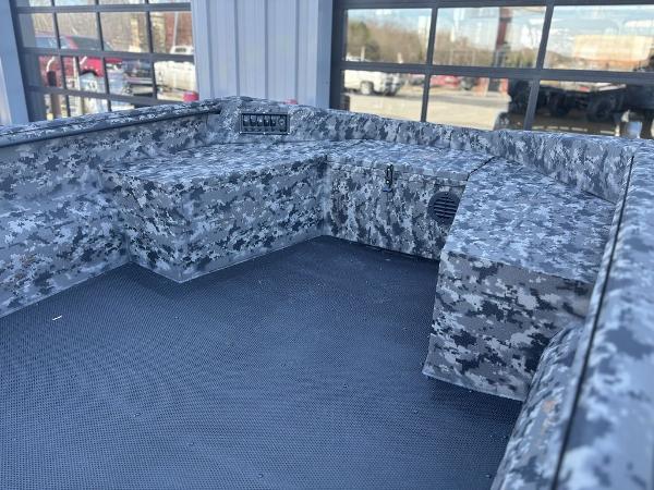 2025 Havoc 1656 VJST boat interior with camo design and control panel.