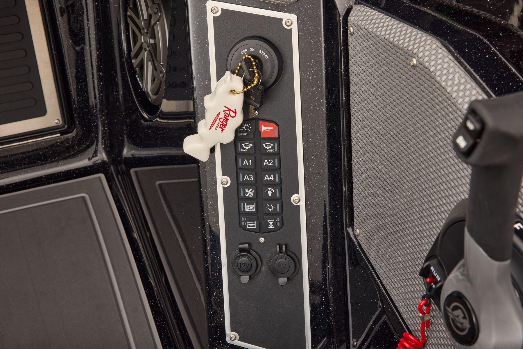Manufacturer Provided Image: Control panel of 2026 Ranger 620xFS Pro boat with key and switches.