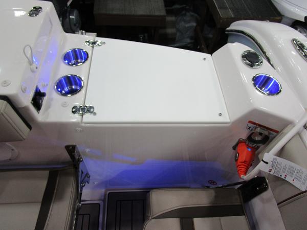 2025 Cutwater C-248 Coupe interior with cup holders and seating area.