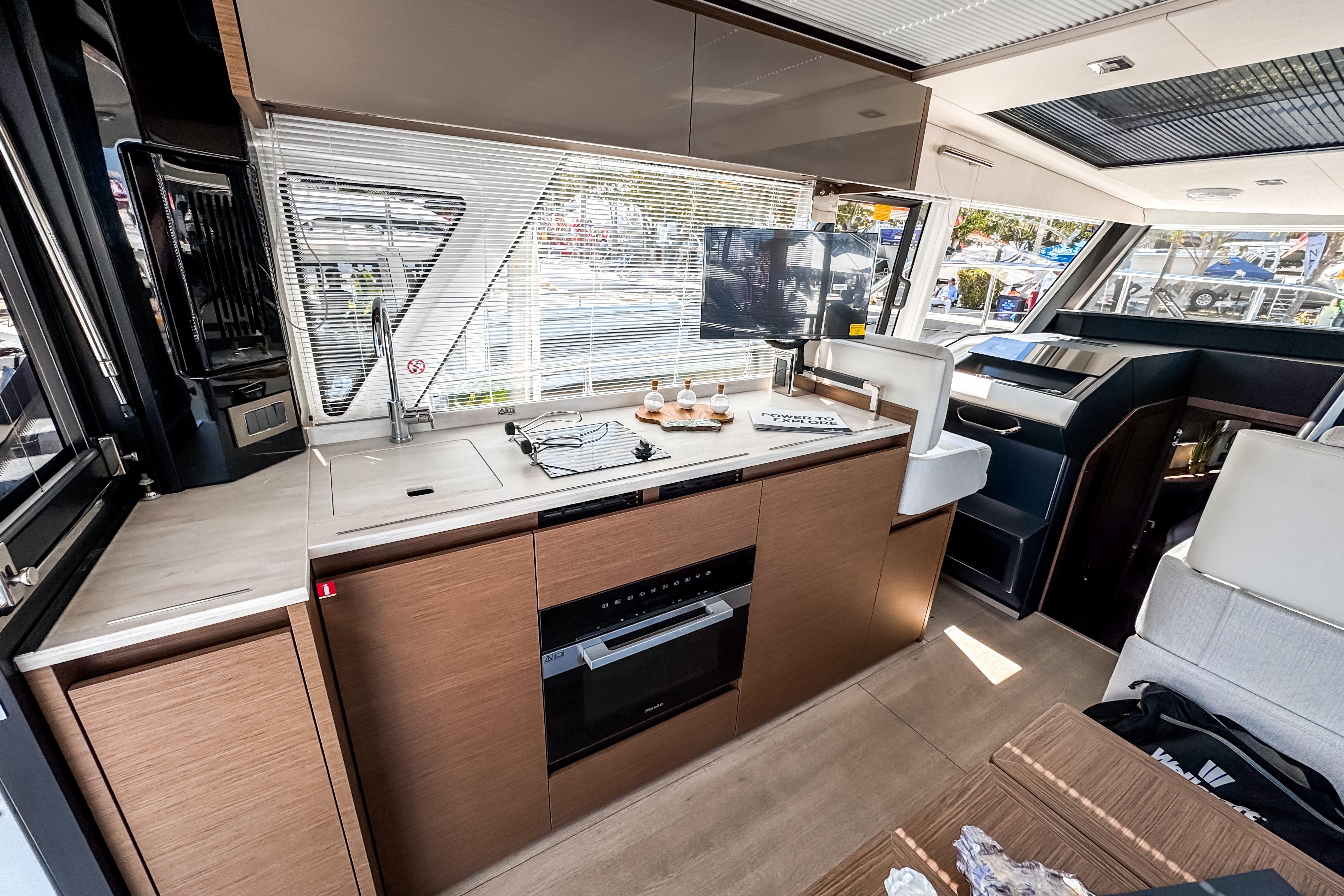 Interior of 2026 Wellcraft 44 Explorer featuring modern kitchen.