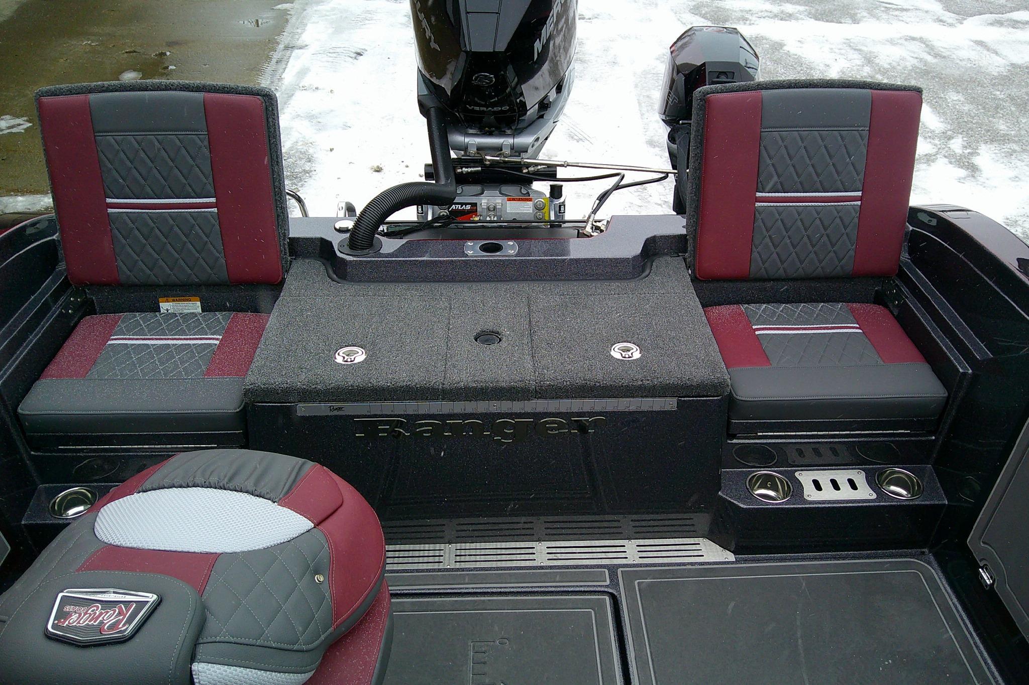 2026 Ranger 620xFS Pro boat interior with red and black seating, featuring modern design.