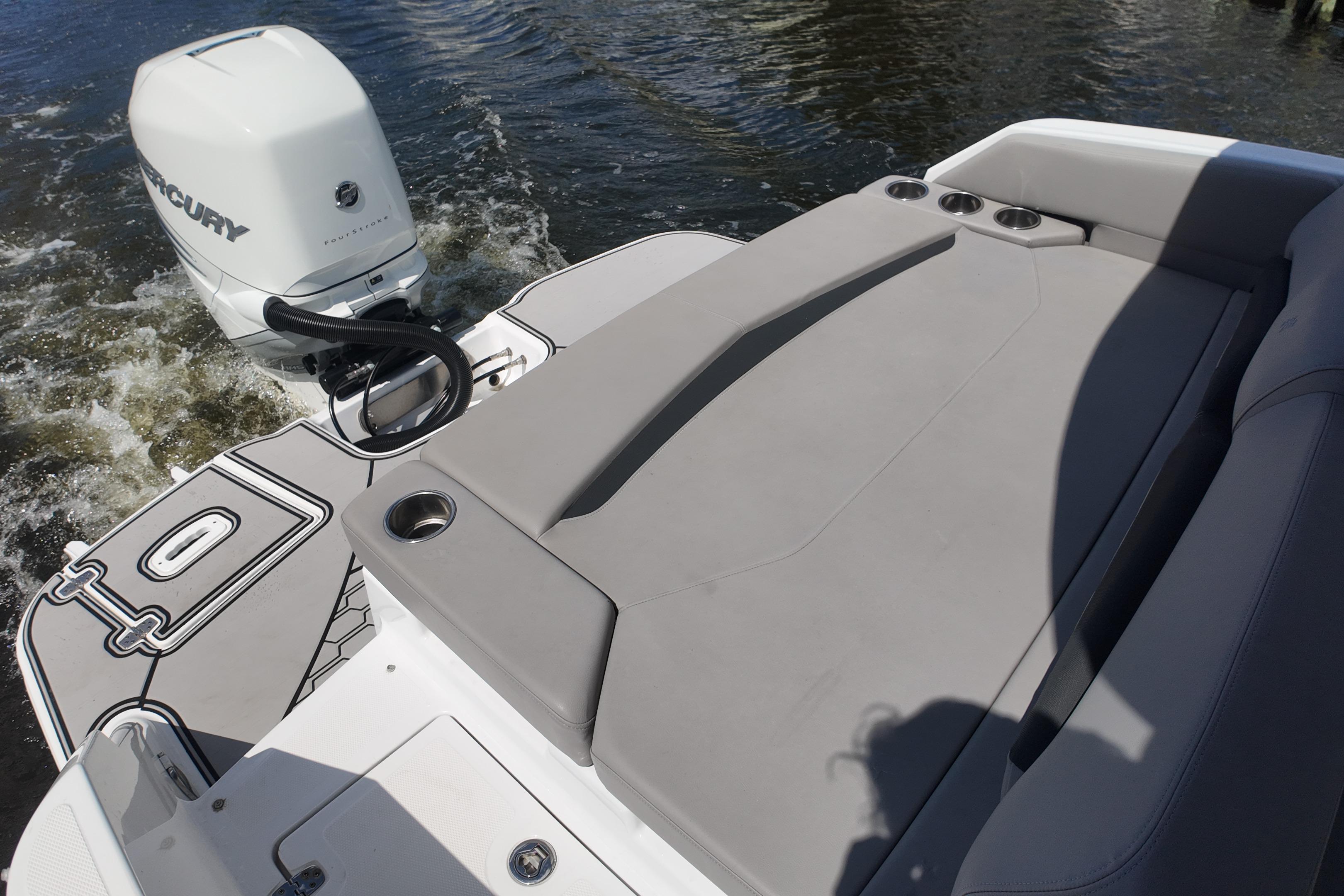 2022 Four Winns HD8 boat with Mercury outboard engine, featuring a spacious sun deck.