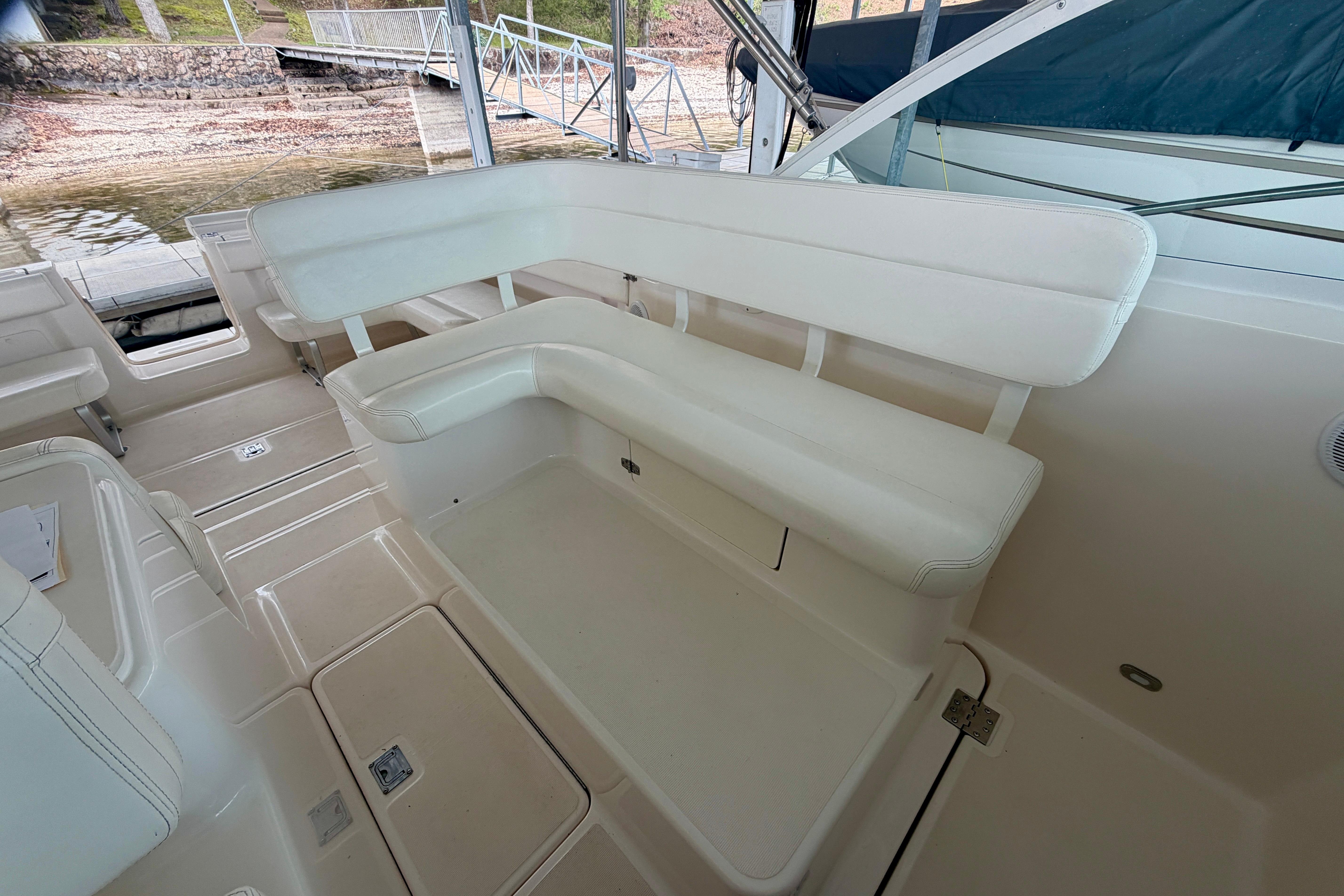 2000 Tiara Yachts 2900 Coronet interior with white seating and spacious deck area.