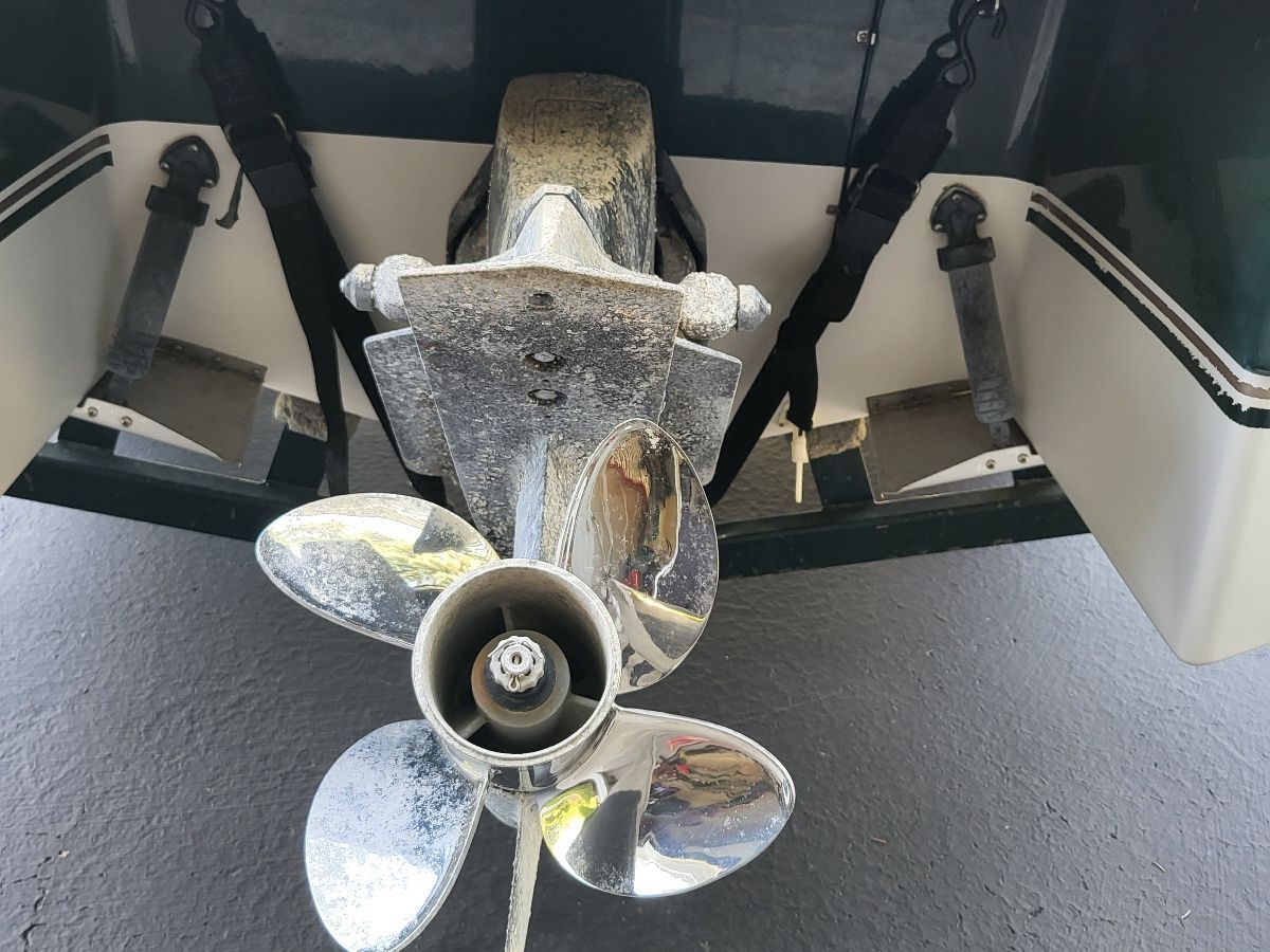 Close-up of a shiny propeller on a boat.