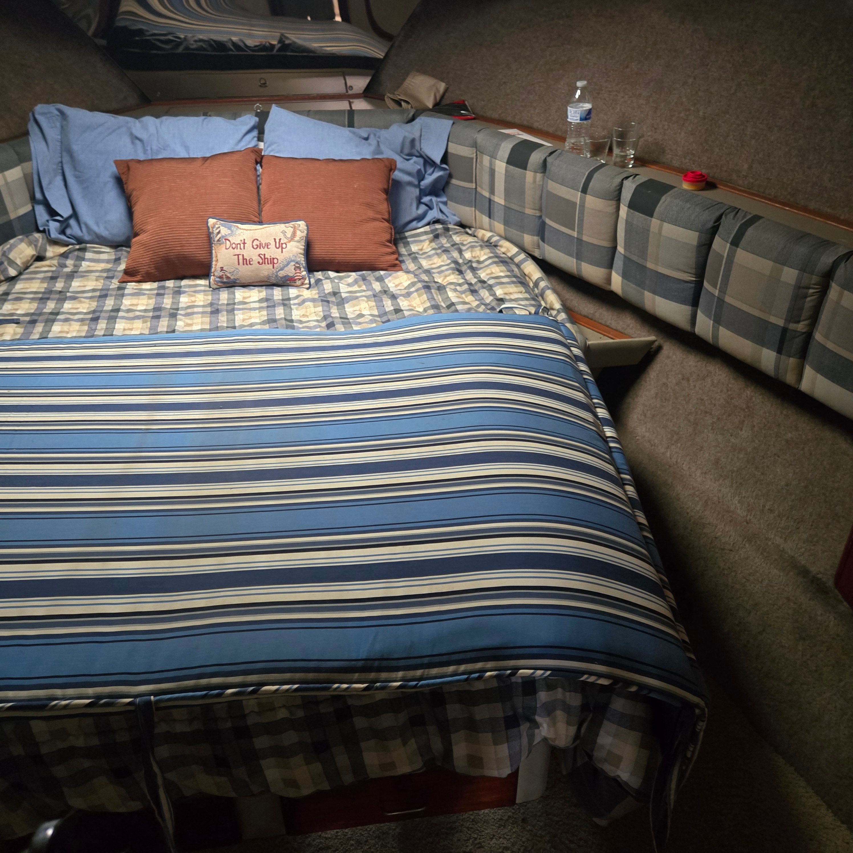 Interior of 1984 Bayliner 3870 Motoryacht with cozy bed.