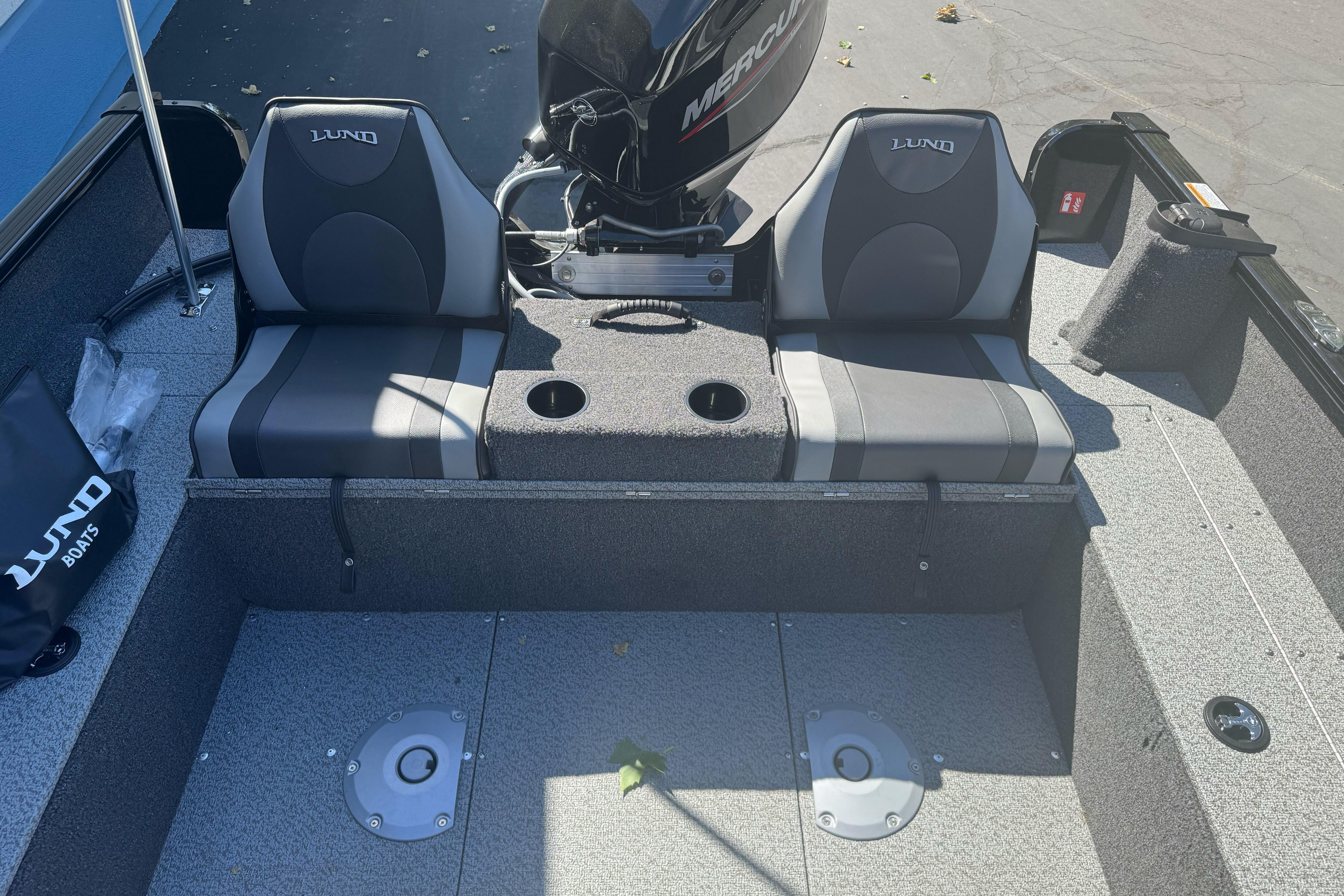 2026 Lund 1650 Rebel XL SS boat interior with dual seats and Mercury engine.