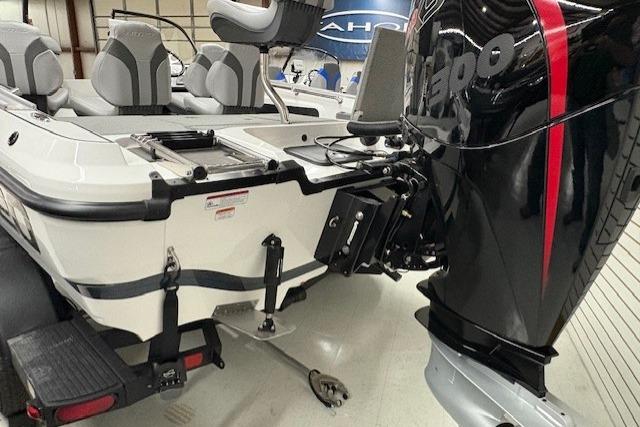 2026 Nitro ZV20 Sport Pro boat with powerful outboard motor in showroom.