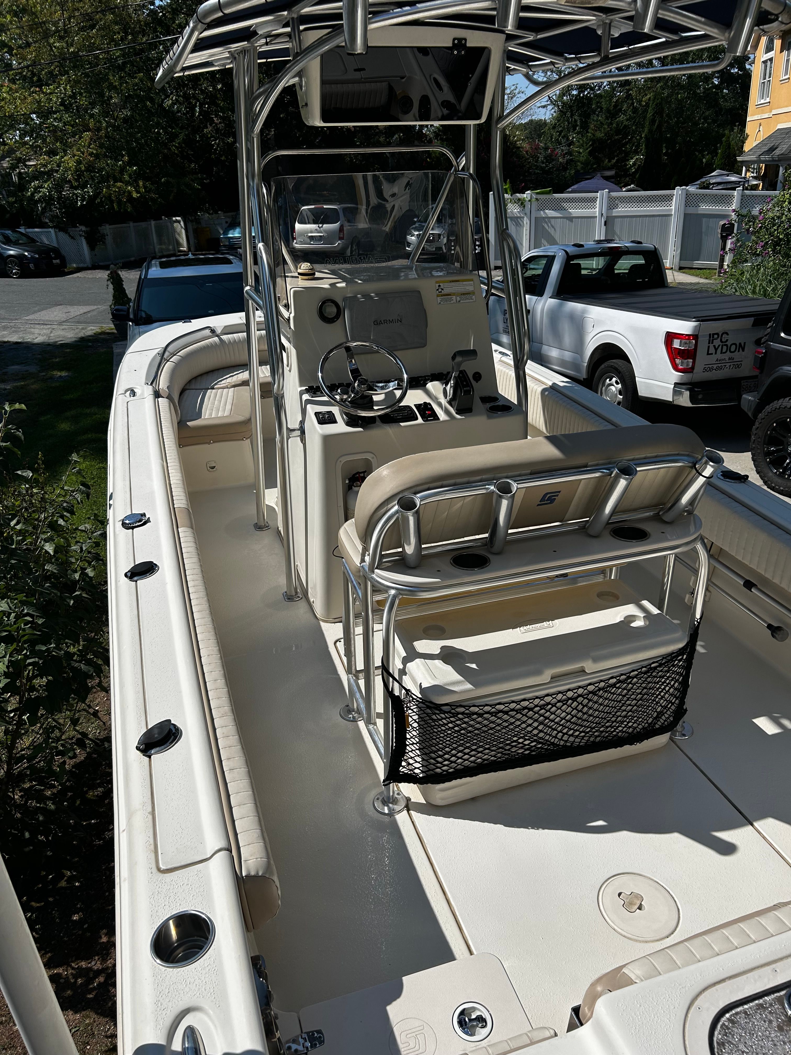 2014 Carolina Skiff 23 Ultra Elite boat with helm and seating area.