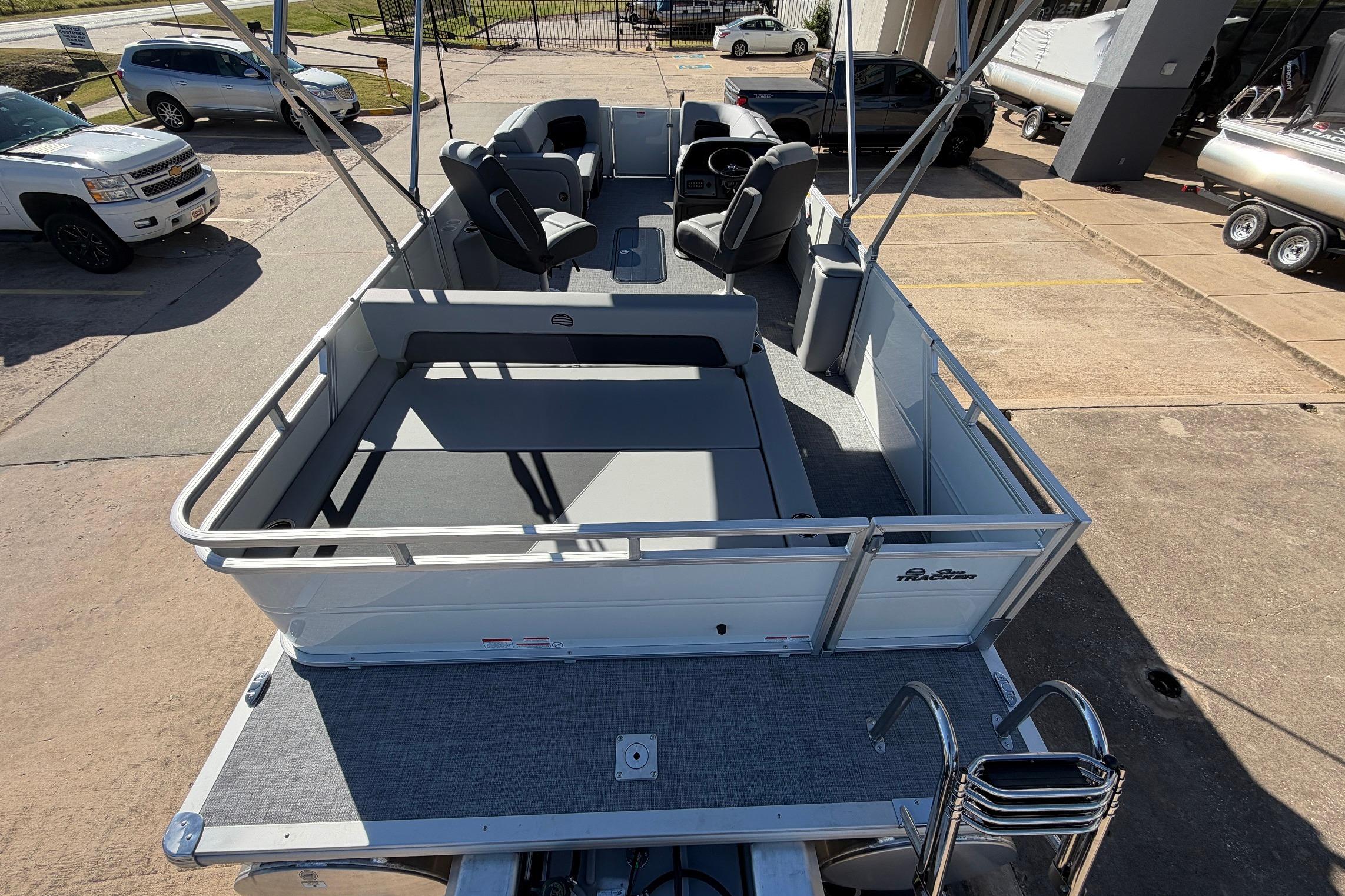 2026 Sun Tracker Party Barge 22 RF XP3 pontoon boat with spacious seating and modern design.