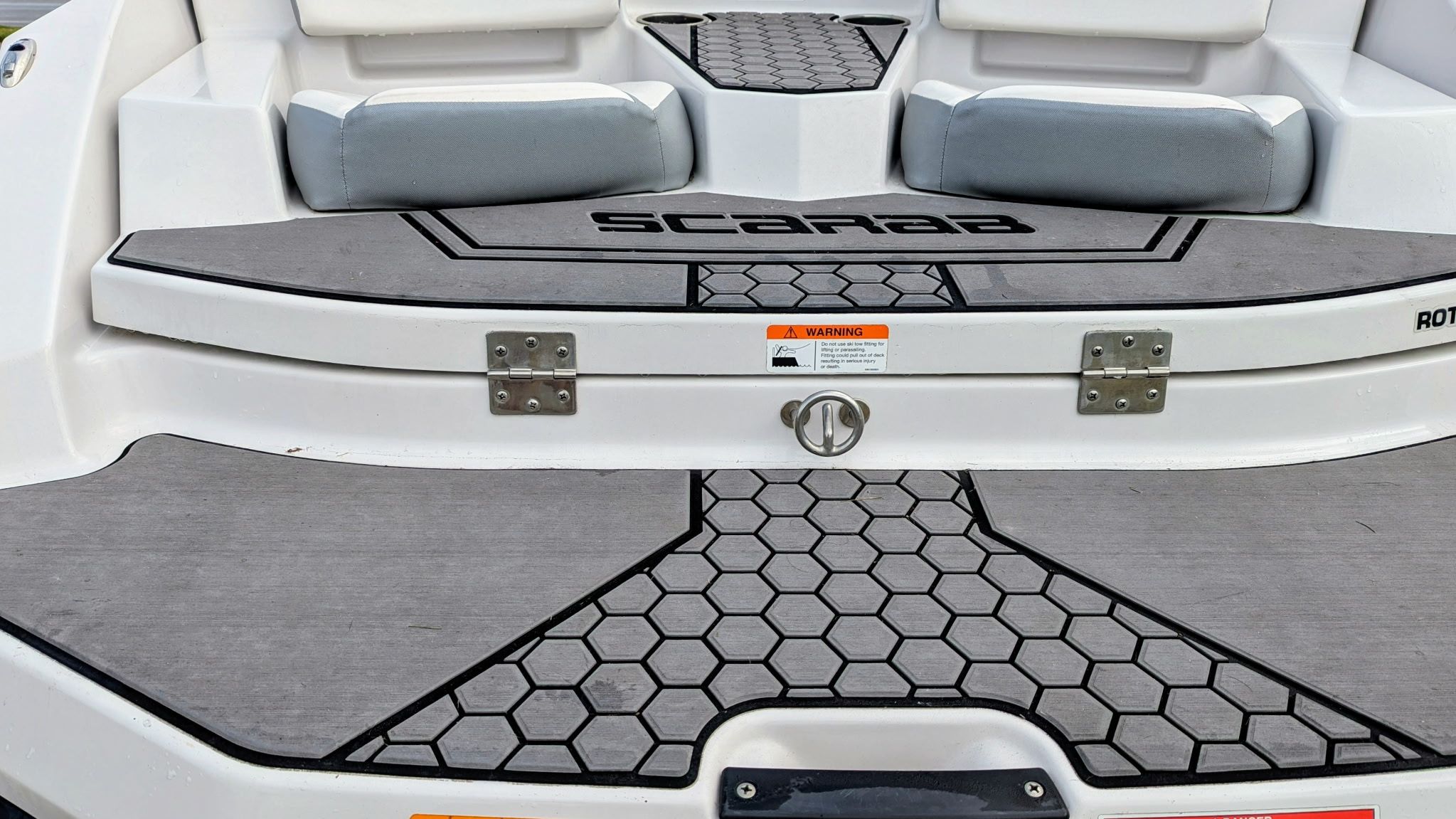 Rear of 2017 Scarab 165 H.O. boat with gray padding.