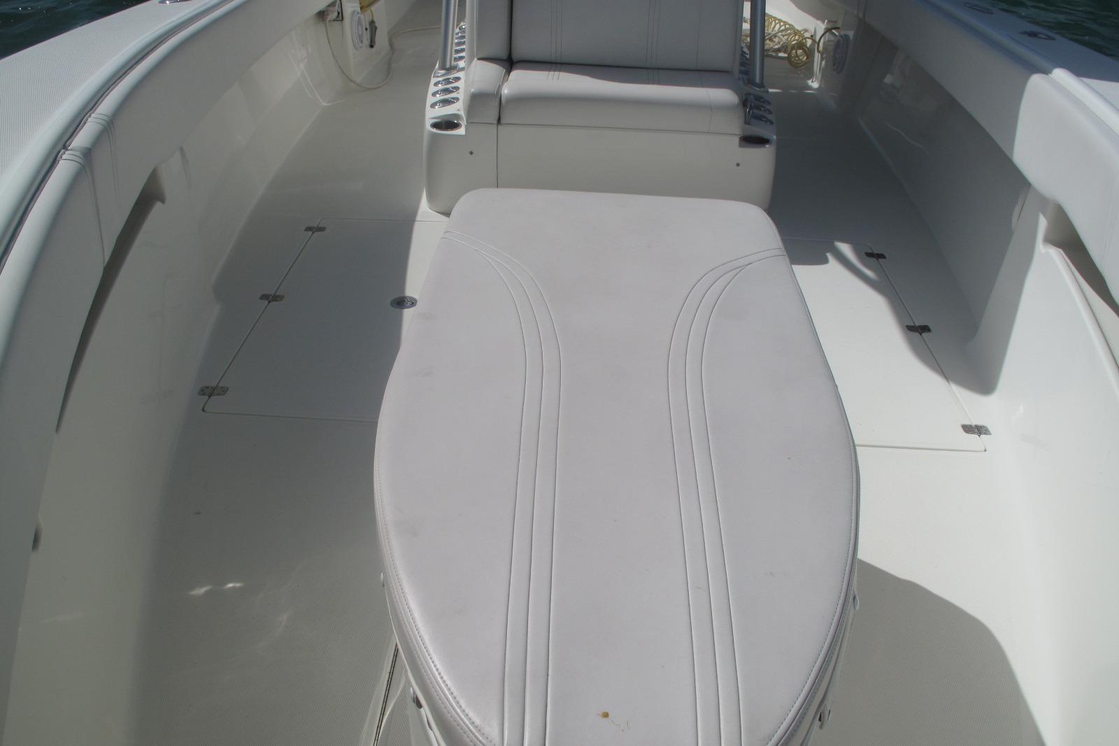 2017 SeaVee 340B boat interior with cushioned seating and storage compartments.