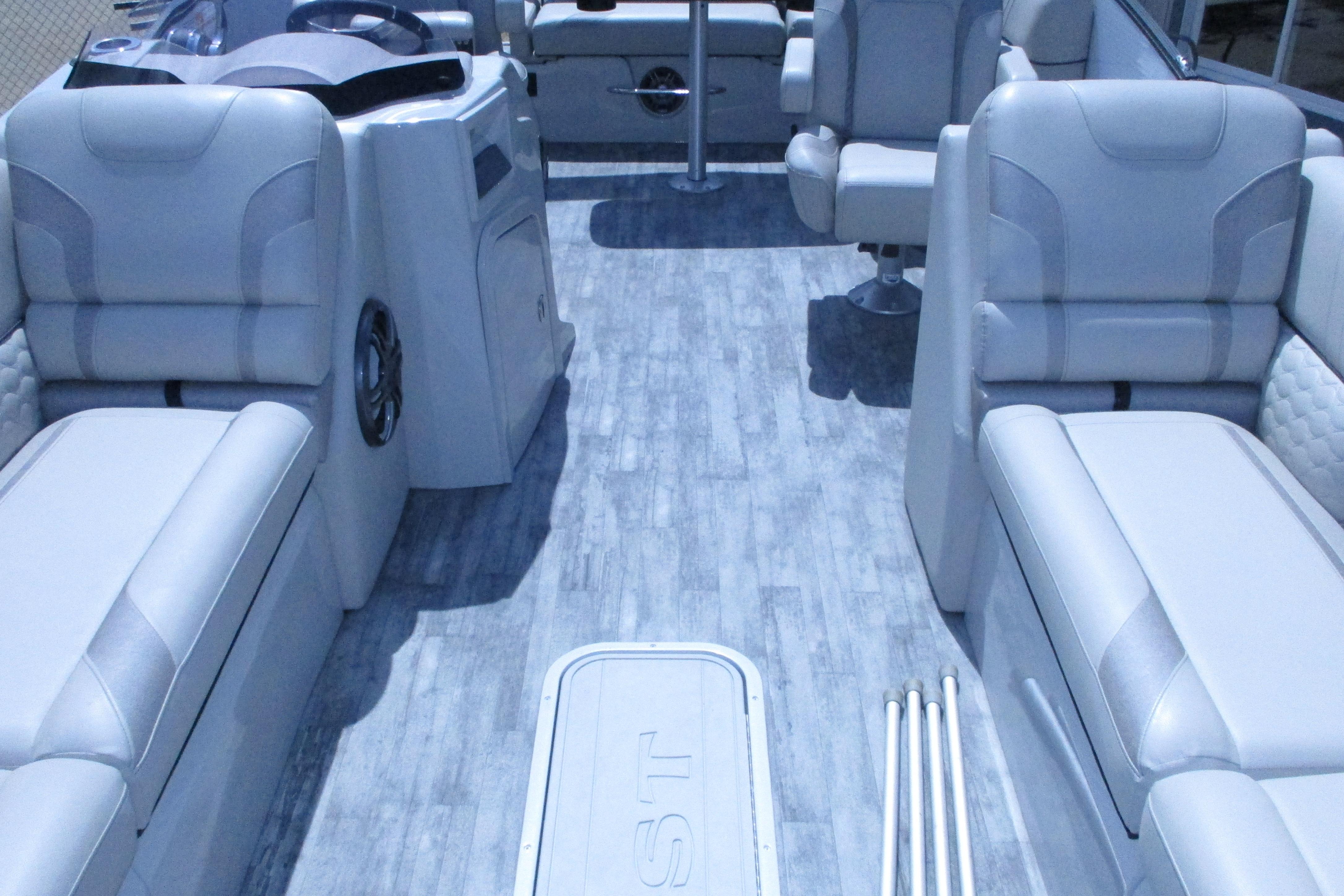2021 Crest Caribbean LX 250 SLS boat interior with luxurious seating and modern design.