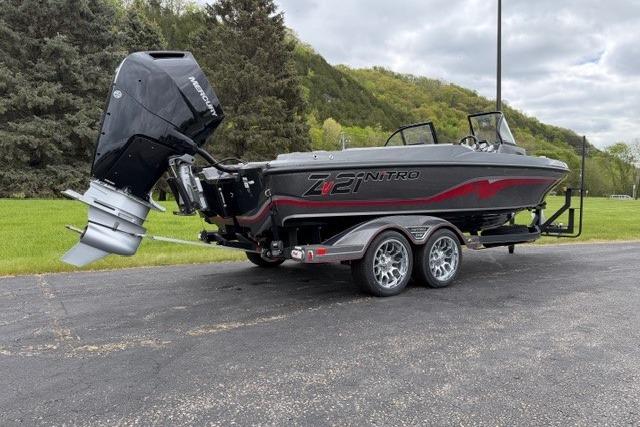 2024 Nitro ZV21 boat on trailer, featuring sleek design and powerful outboard motor.