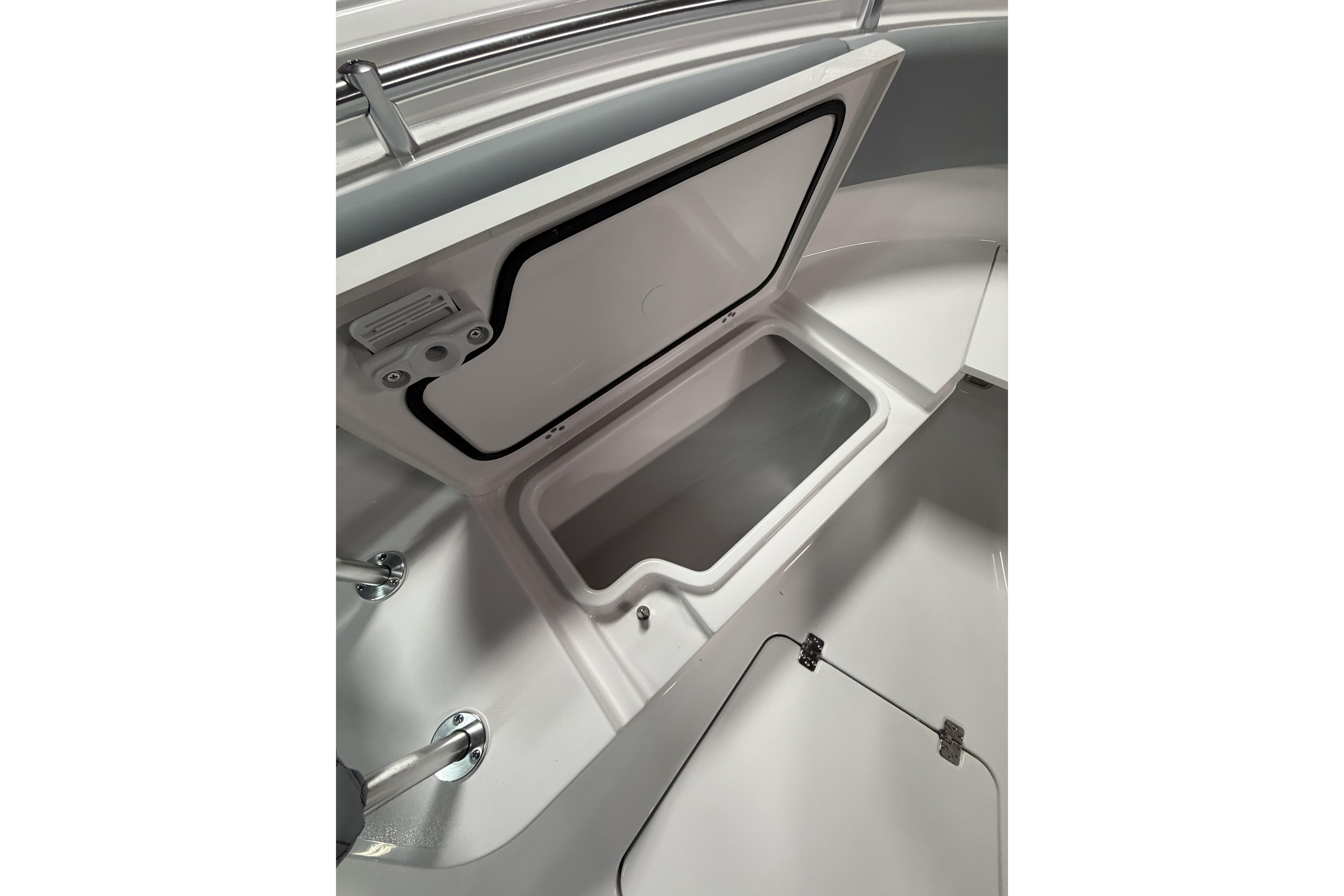 2026 Sportsman Open 232 Center Console storage compartment, showcasing sleek design and functionality.
