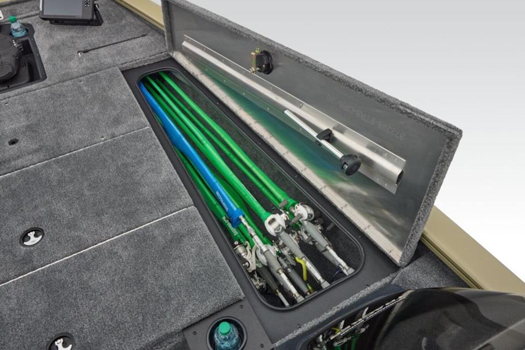 2026 Tracker Pro Team 195 boat with open storage compartment for fishing rods.
