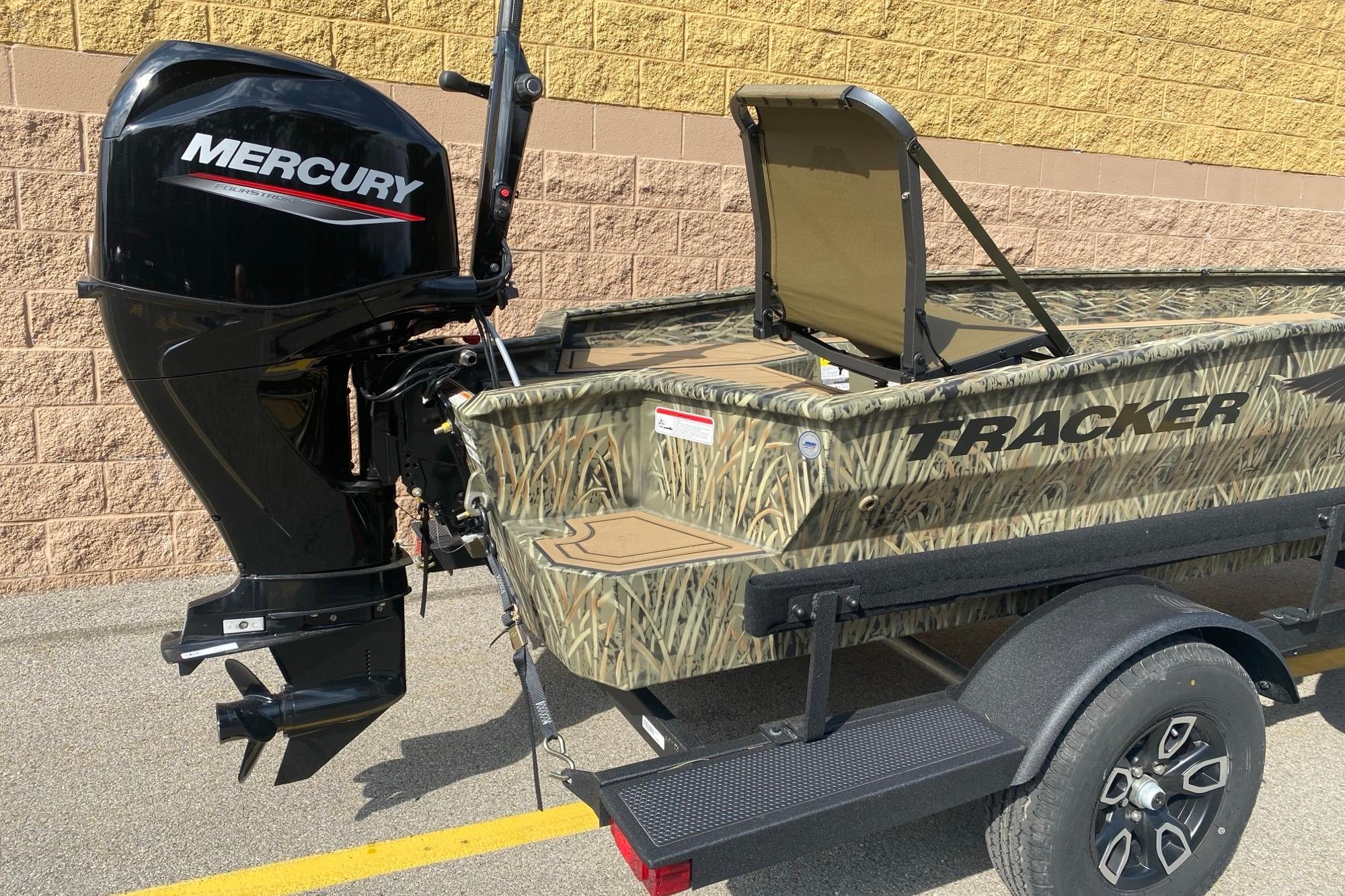 2026 Tracker Grizzly 1650 T Prairie Wings Edition boat with Mercury outboard motor.
