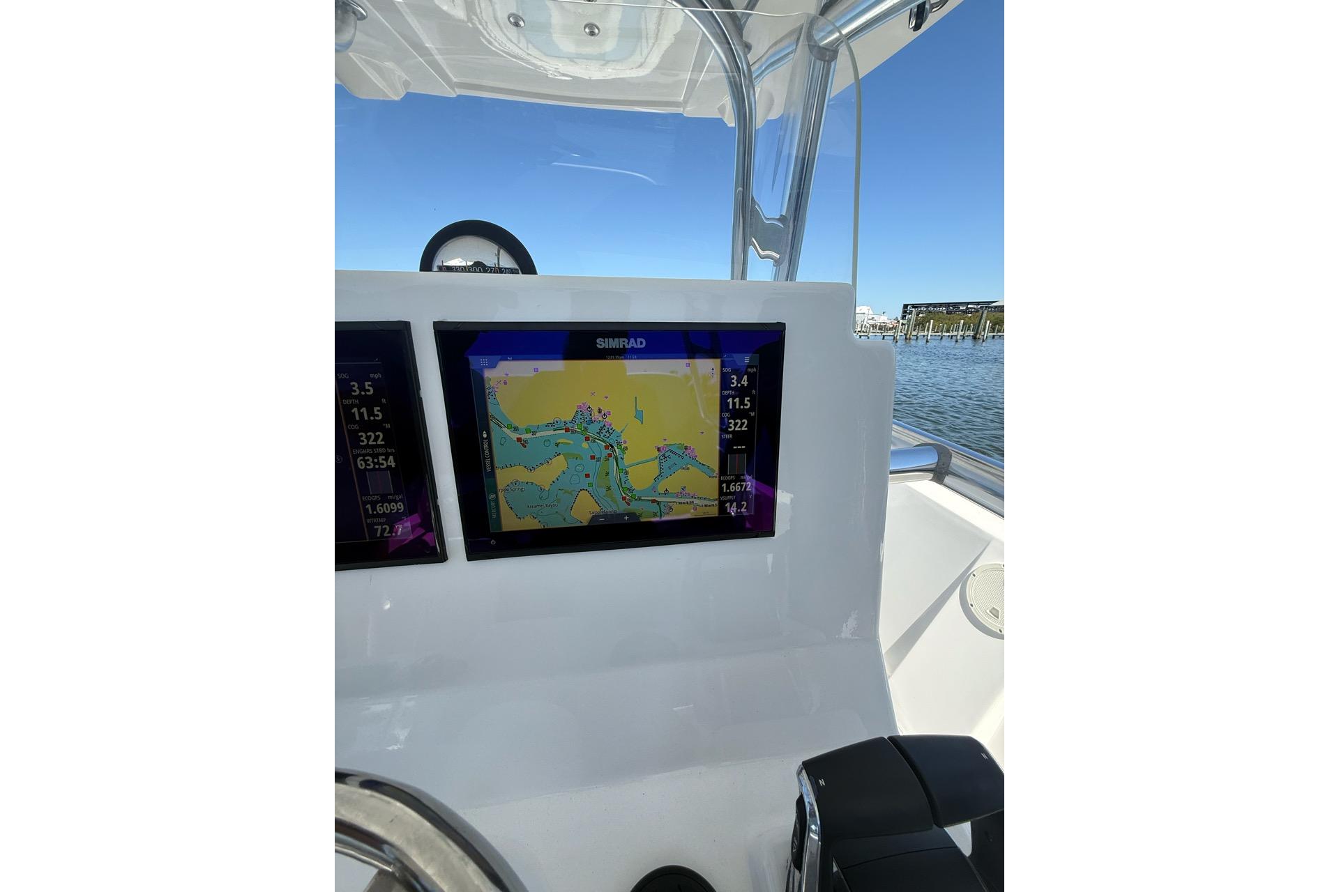 Center console of 2021 Custom Infusion 34 CC boat with navigation display.