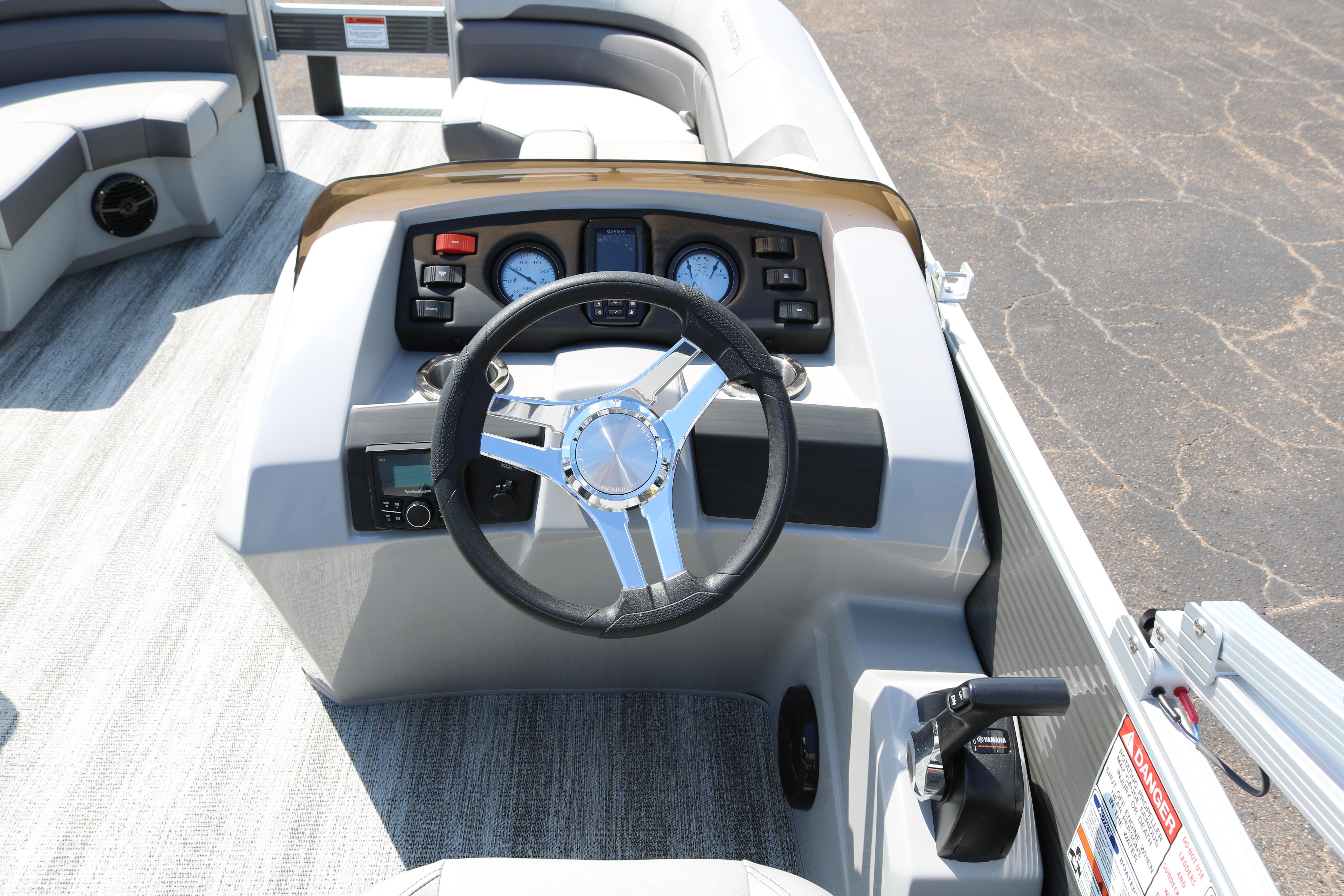 2026 Bennington 20SXSNP REAR FISH boat dashboard with steering wheel and controls.