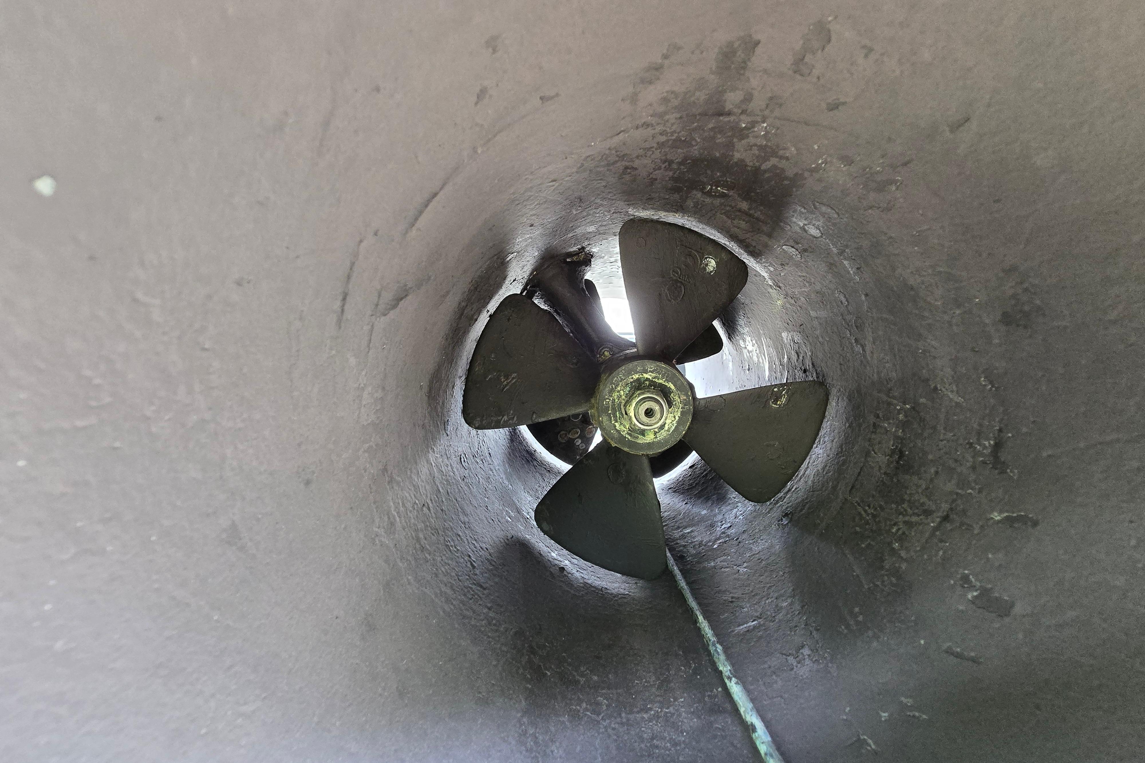 Bow thruster of a 1980 Hatteras 70 Motor Yacht, showcasing propeller detail.