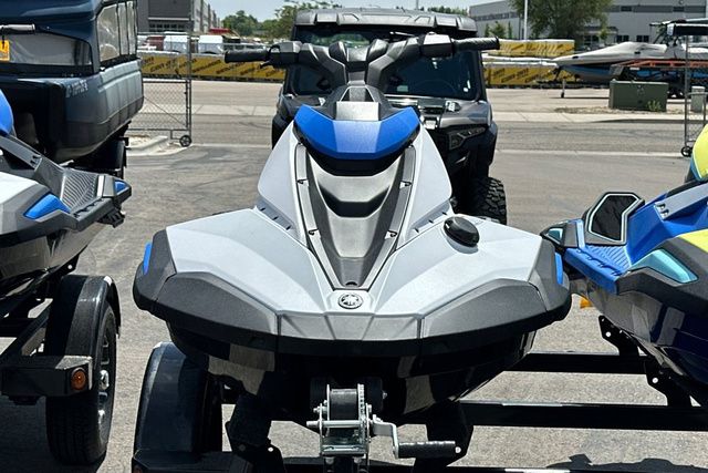 A Yamaha WaveRunner Jetblaster in black sits on a trailer, surrounded by other watercraft.