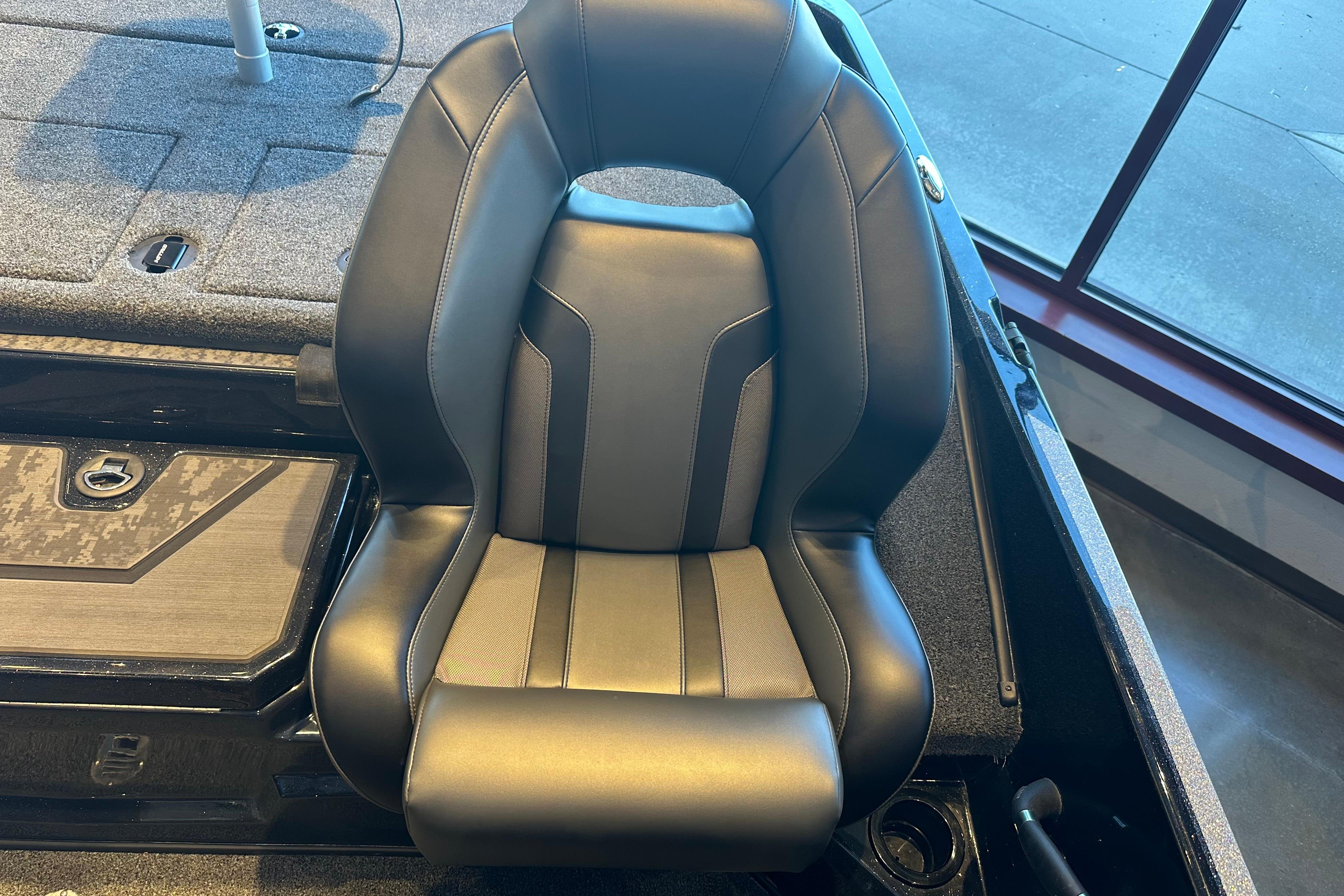 2026 Nitro Z19 XL boat seat, black and gray design, in showroom setting.