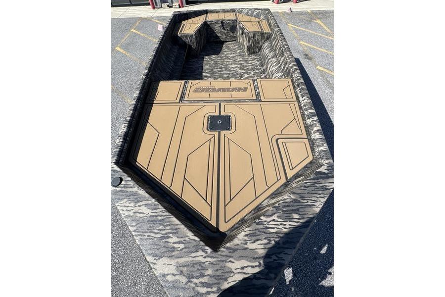 2026 Havoc 1656 MRST MACH 1 boat interior with camouflage design and tan deck.