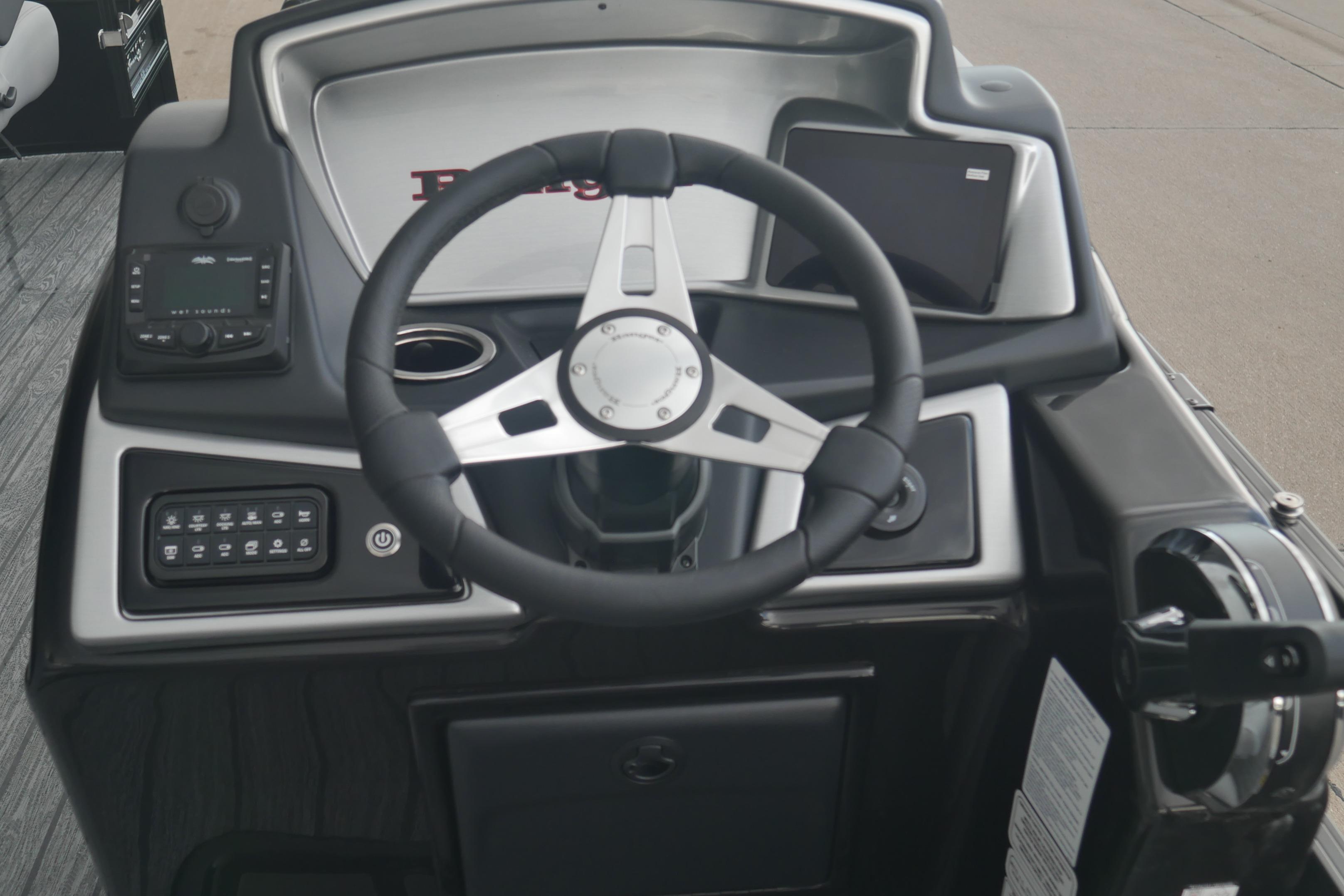 Steering console of 2026 Ranger 220FC boat with modern controls and dashboard.