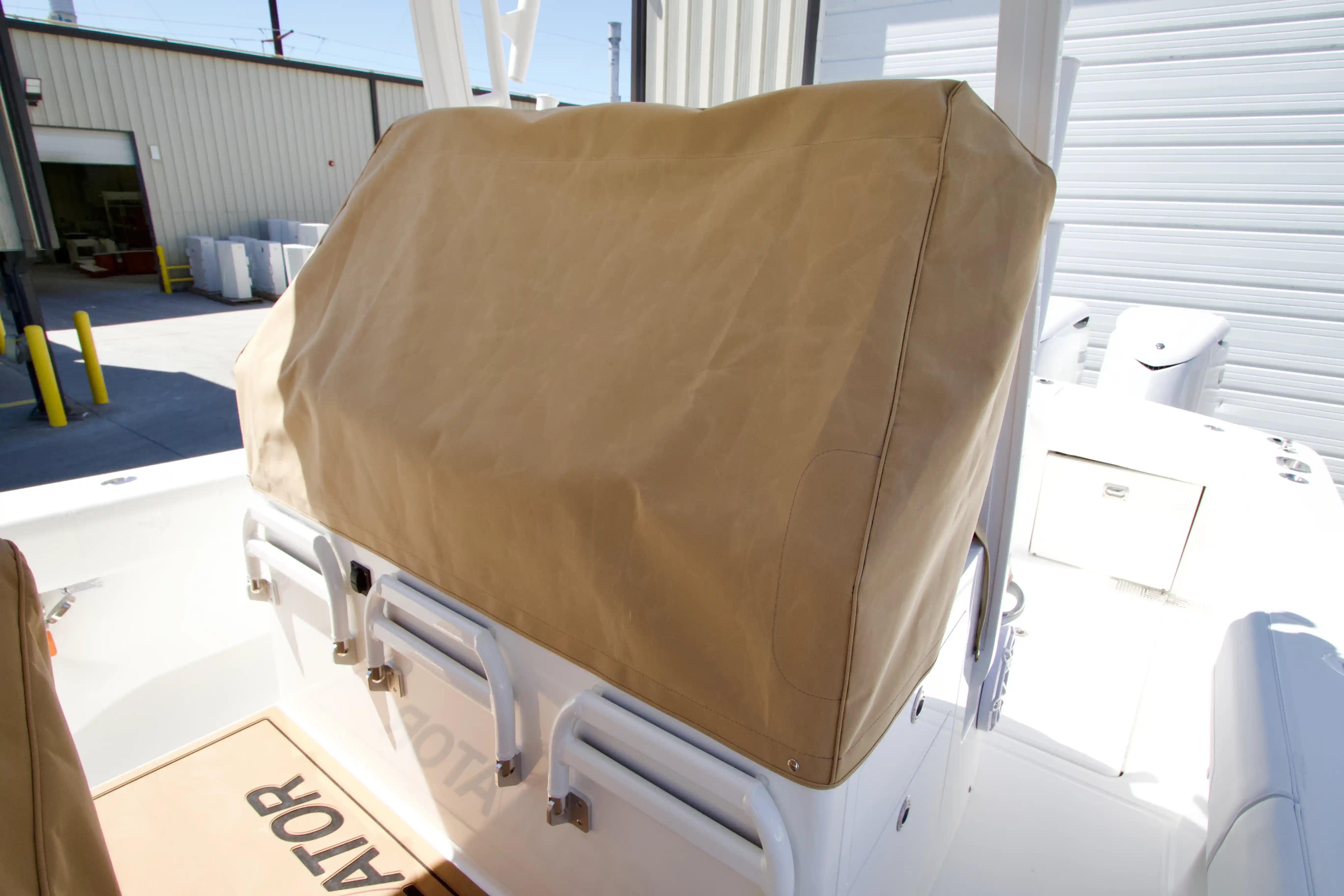 2027 Regulator 35 boat with covered console in a marina setting.