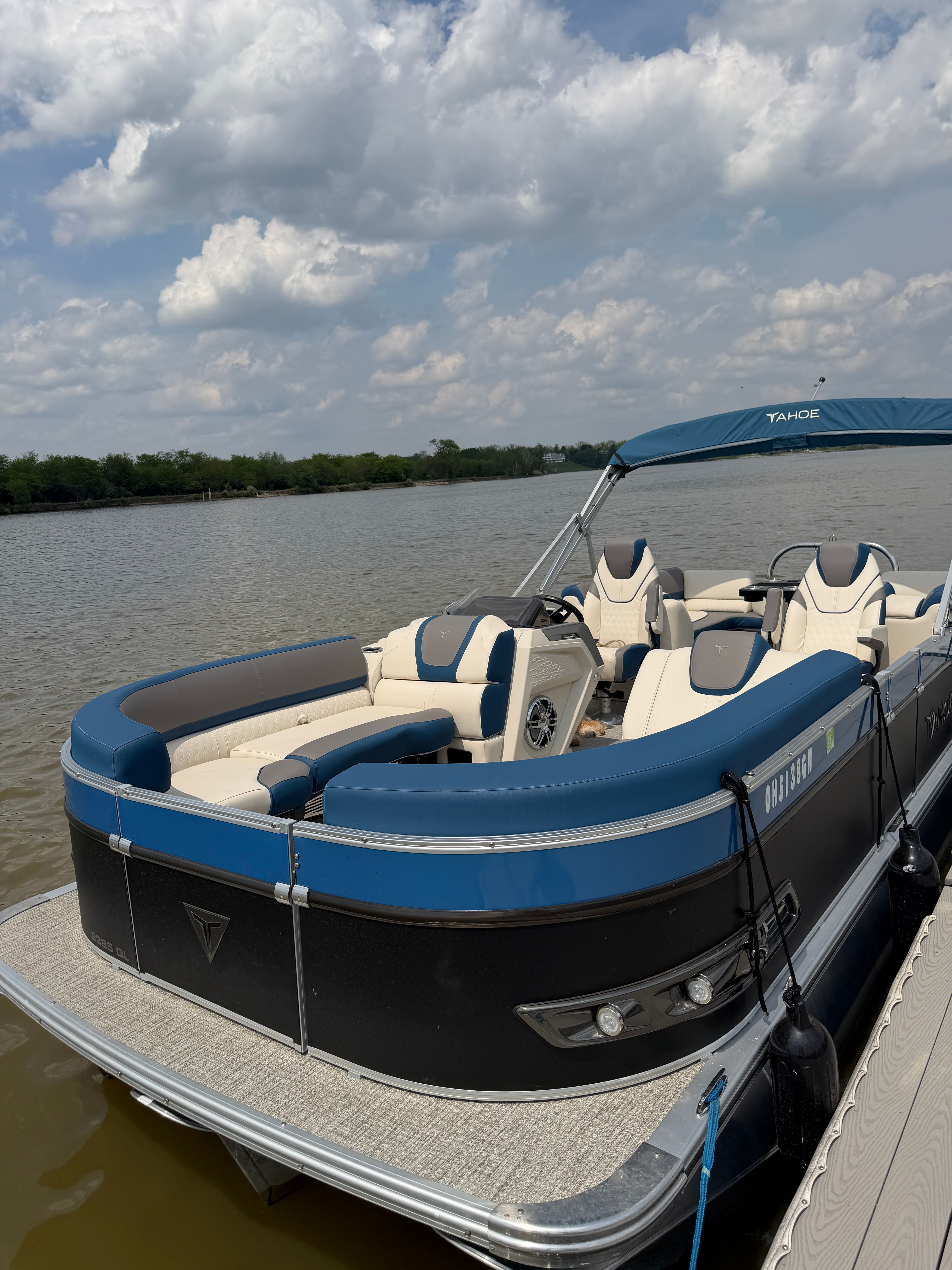 2024 Tahoe Pontoon Cascade Quad Lounger on a serene lake.