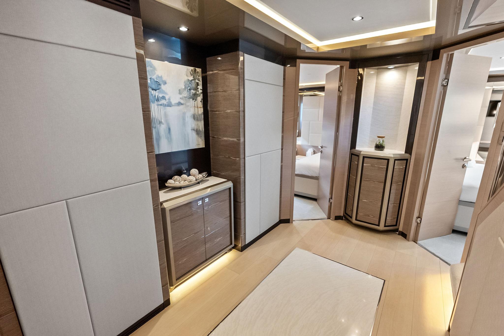 Luxurious interior of 2024 Ocean Alexander 35 Revolution yacht, featuring elegant wood finishes and modern decor.