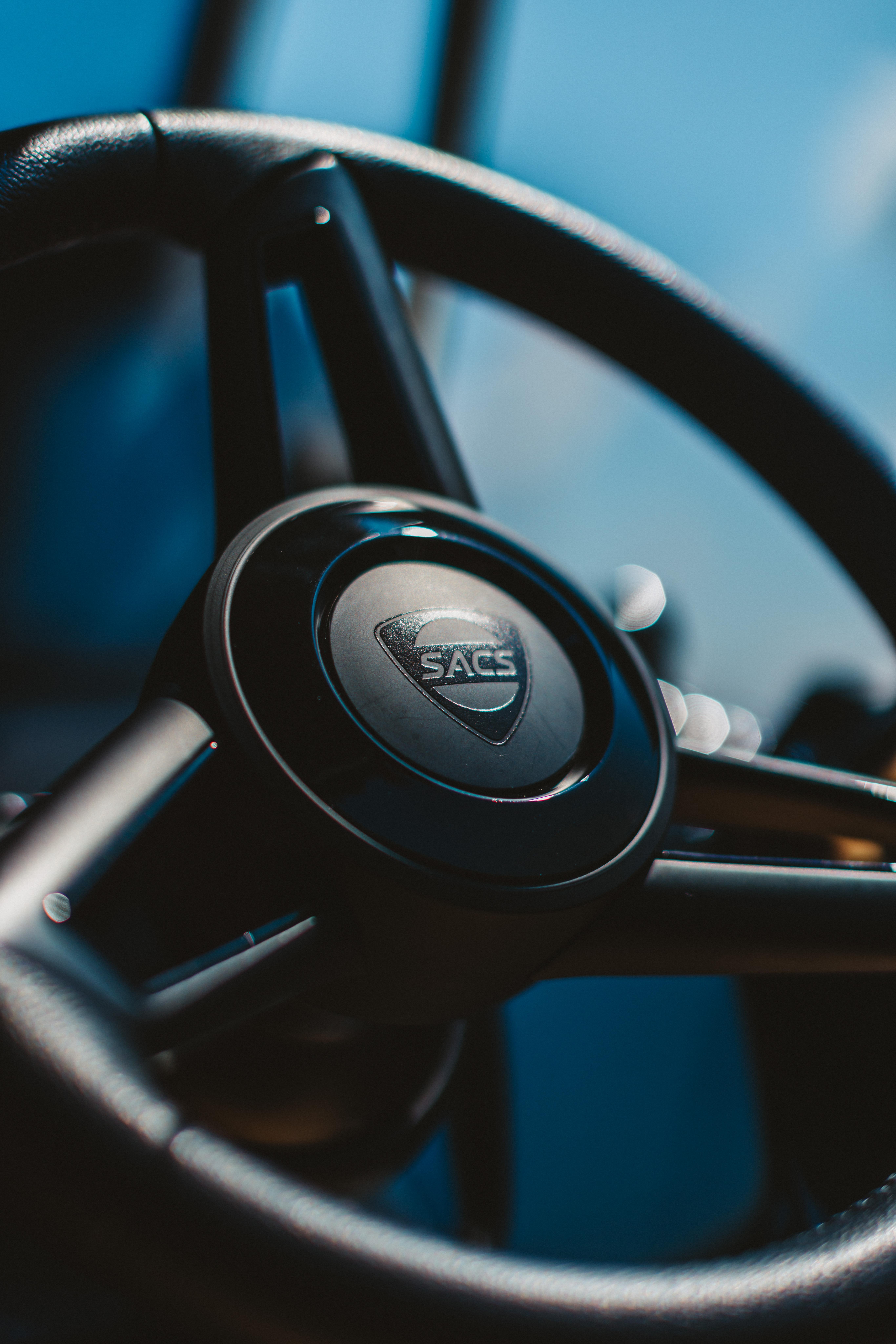 Steering wheel of 2026 SACS Strider 11 boat, close-up view.