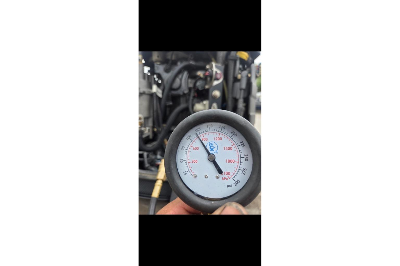 Pressure gauge reading on a 2015 Tracker Pro Team 190 TX boat engine.