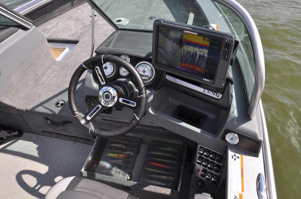 Manufacturer Provided Image: 2019 Lund 2175 Pro-V boat dashboard with Lowrance fish finder and steering wheel.