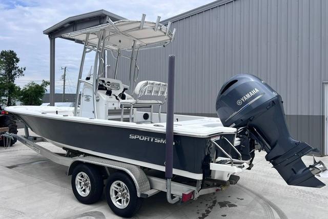 2021 Sportsman Tournament 234 SBX Bay Boat with Yamaha engine on trailer.