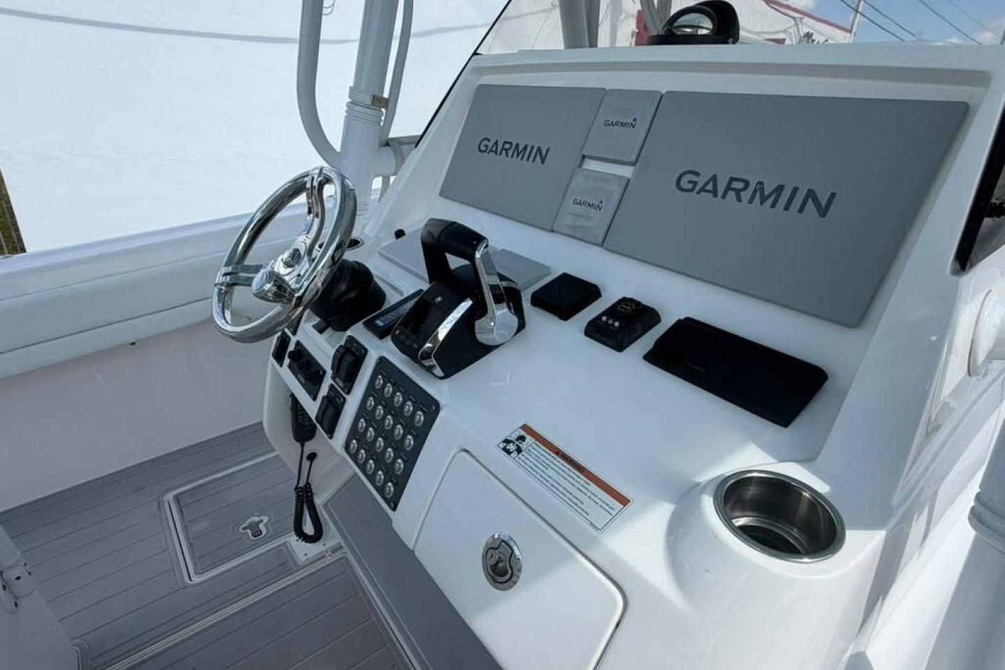 2020 Intrepid 375 Nomad SE helm with Garmin navigation system and sleek controls.