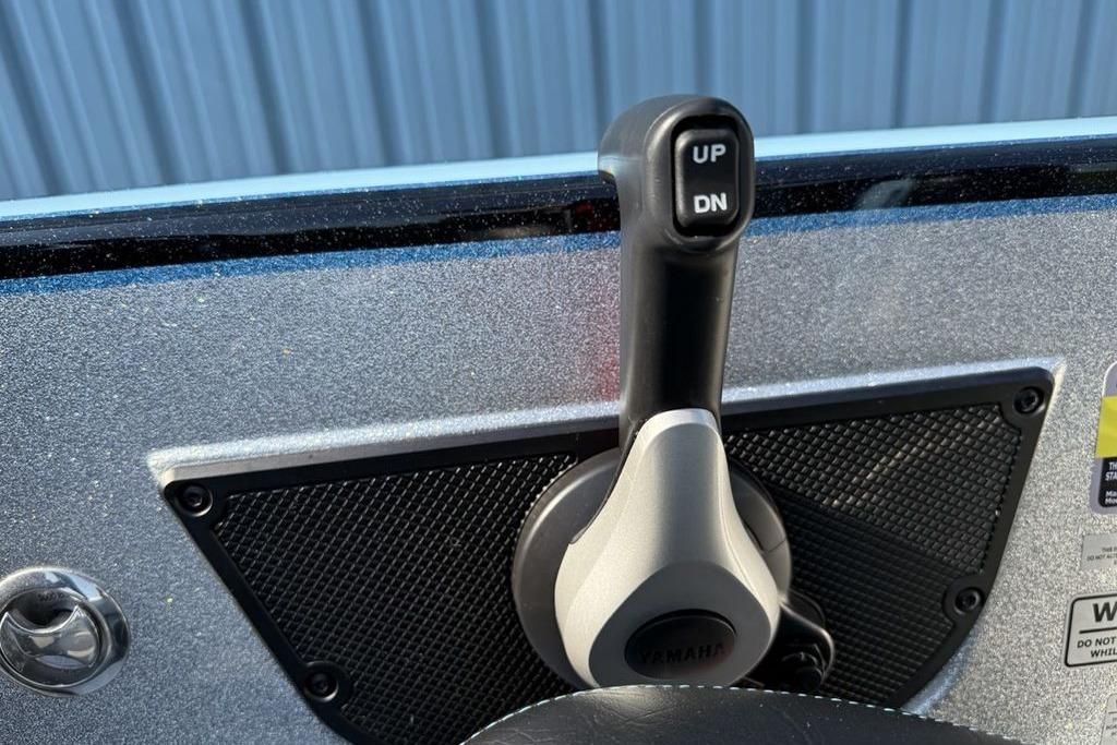 Boat throttle control lever on a 2026 Phoenix 20 XE.
