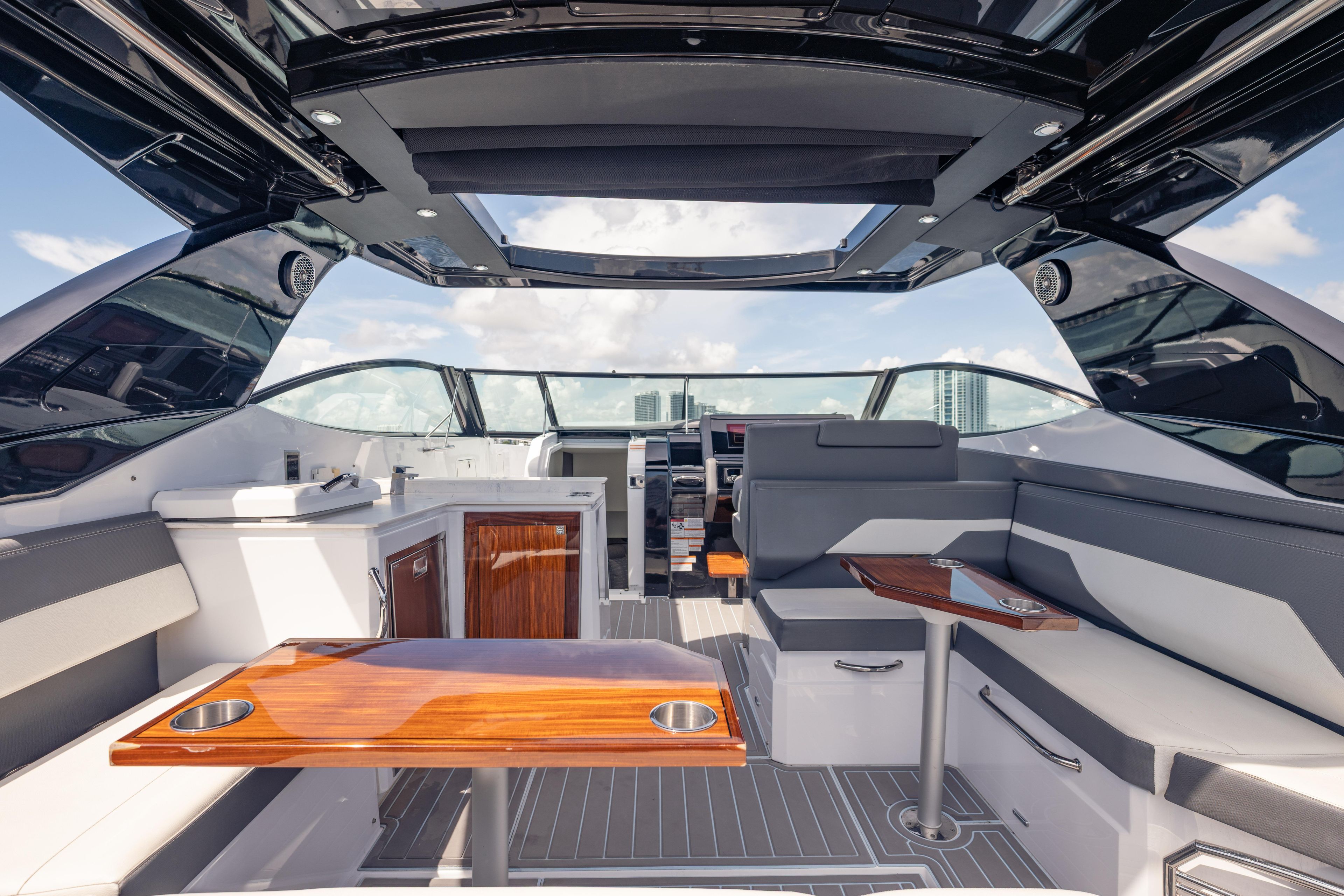 Luxurious interior of 2021 Cruisers Yachts 38 GLS with sleek seating and modern design.