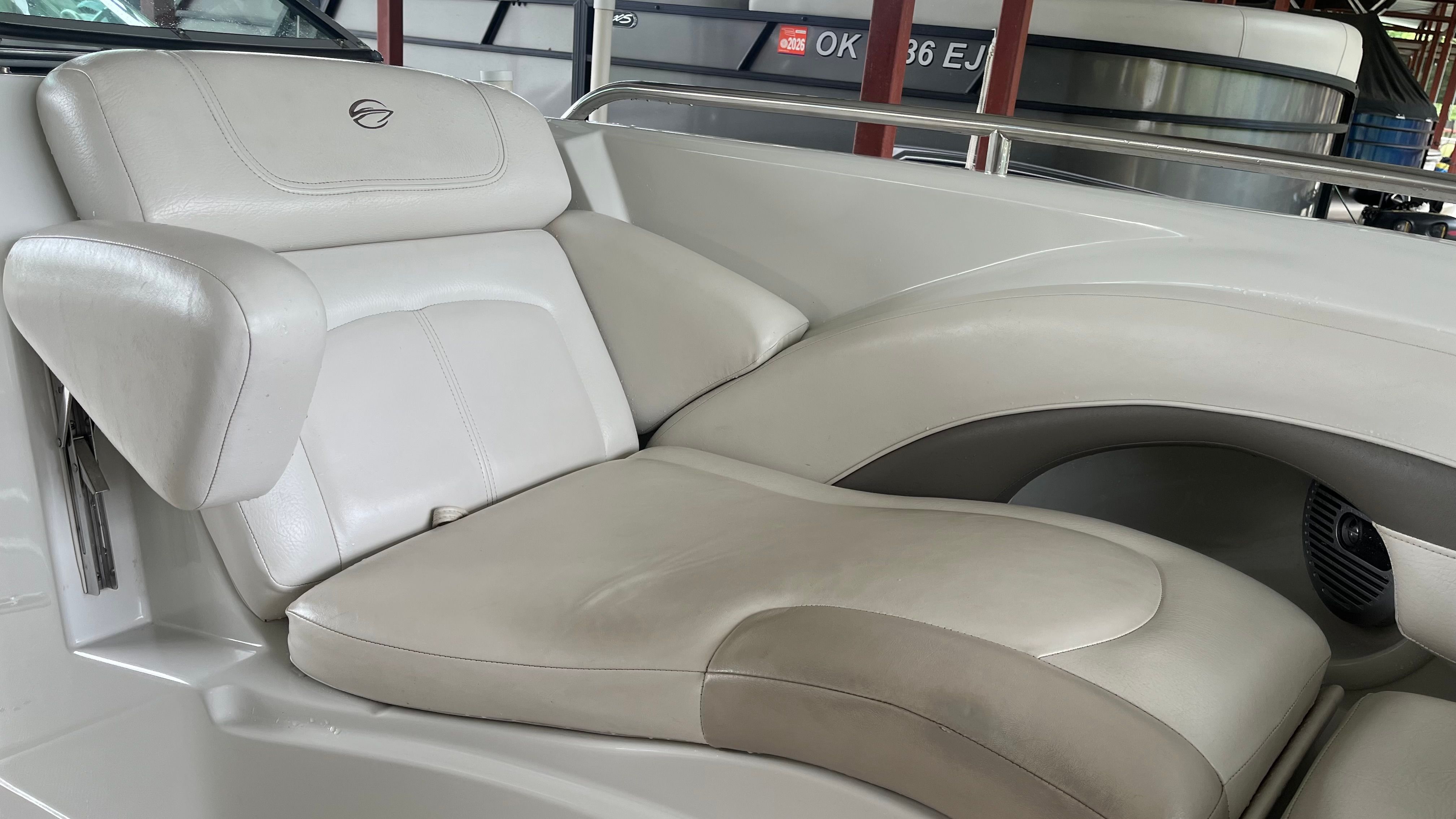 The image shows a beige seat in a 2008 Crownline 252EX boat.