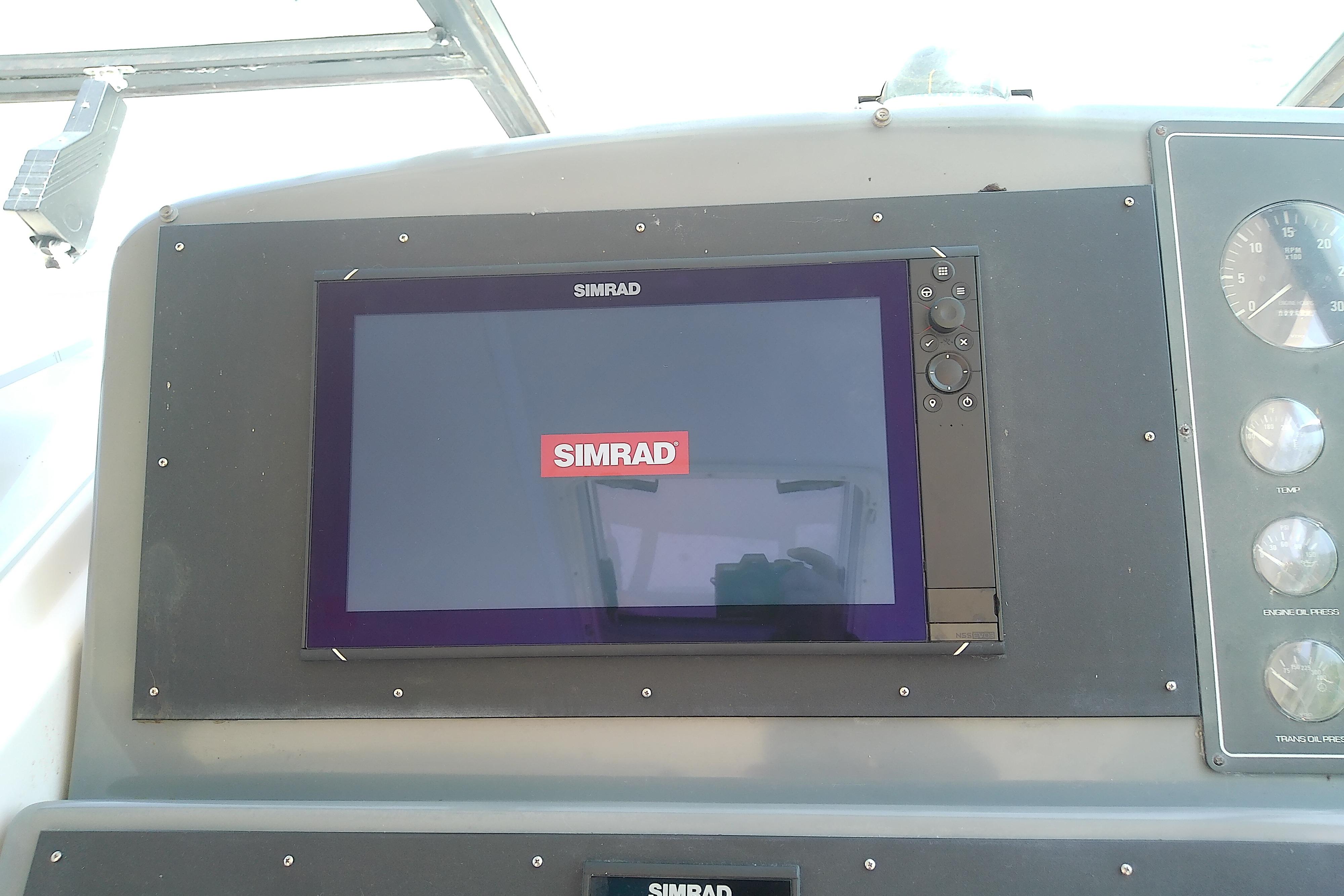 Simrad navigation display on 2000 Tiara Yachts 4100 Open dashboard.