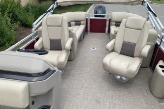 2024 Sun Tracker Party Barge 22 DLX interior with plush seating and spacious layout.