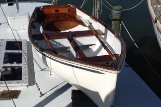 1985 Gozzard PILGRIM sailboat with wooden interior, docked at a marina.